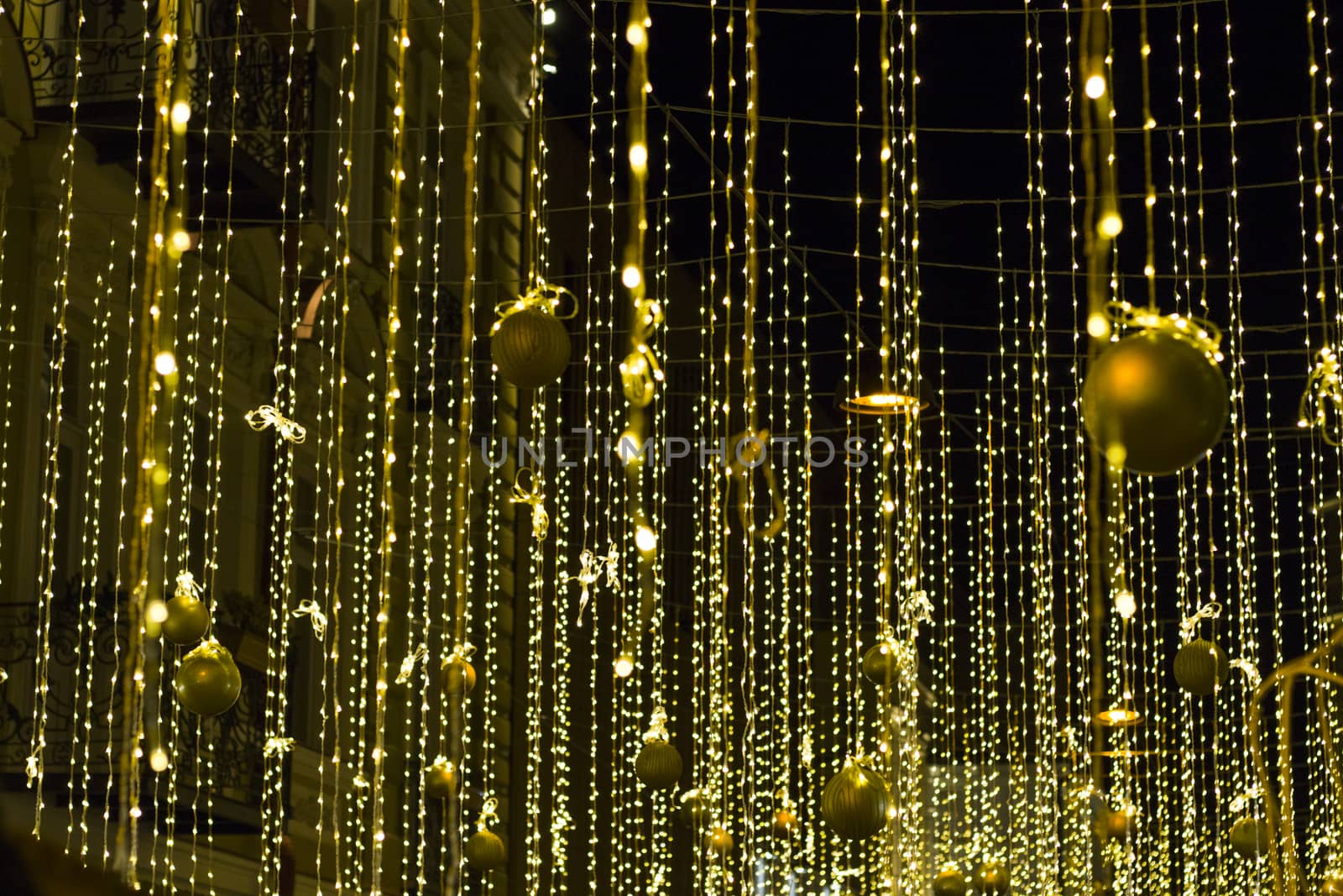 Christmas ornaments and lighting in the street by Taidundua