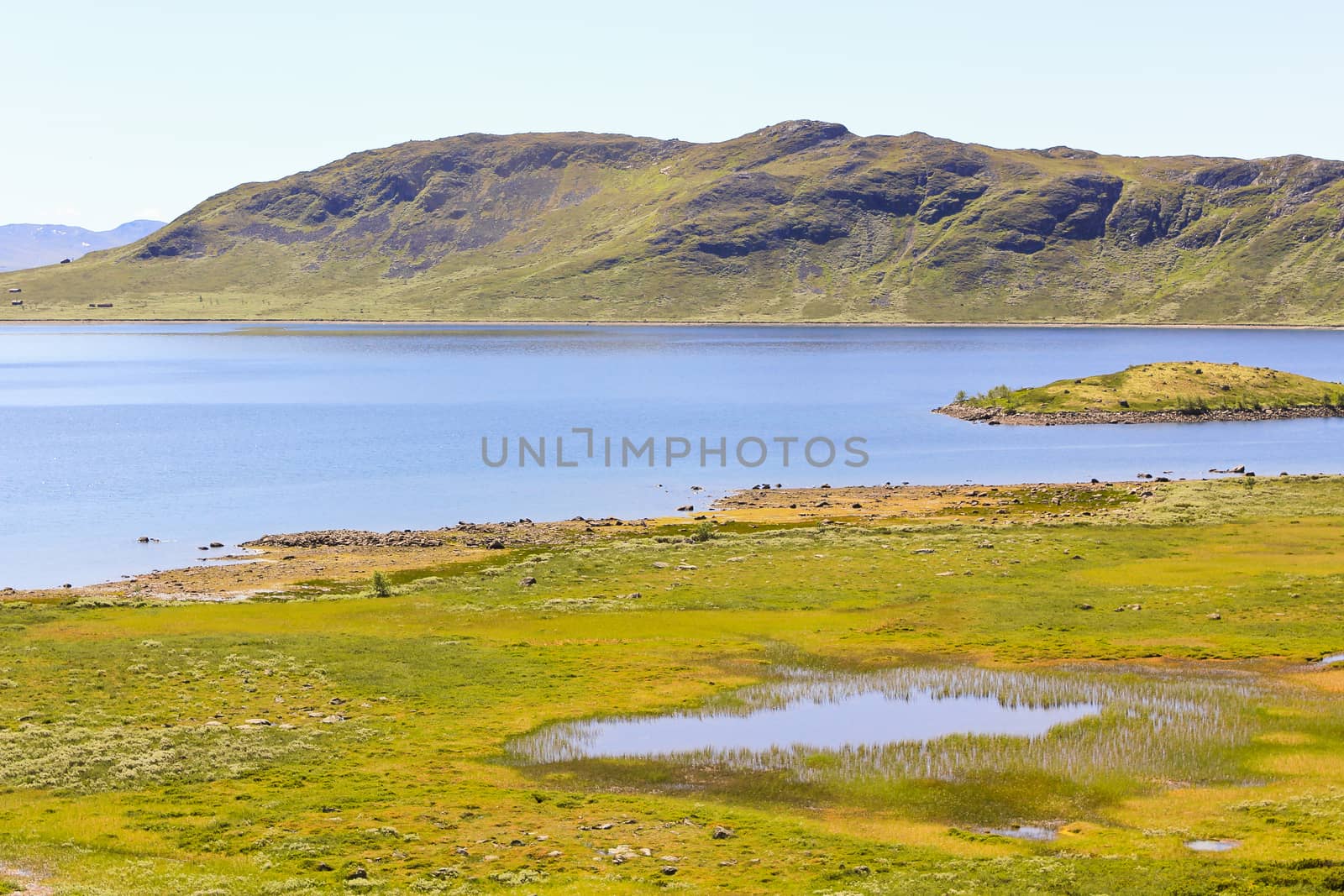 Beautiful Vavatn lake and mountains in the summertime in Hemsedal, Buskeud, Norway.