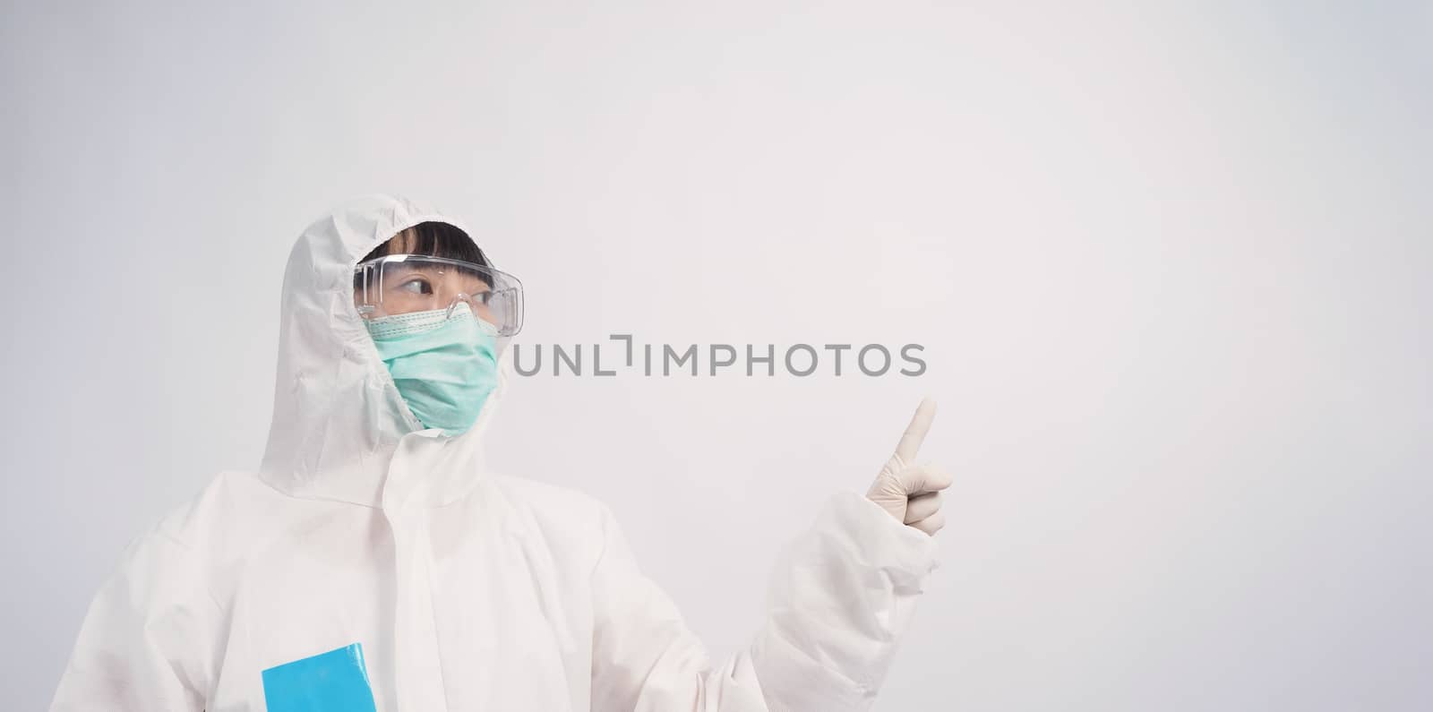 Asia woman doctor in PPE suit or Personal Protective Equipment  by gnepphoto
