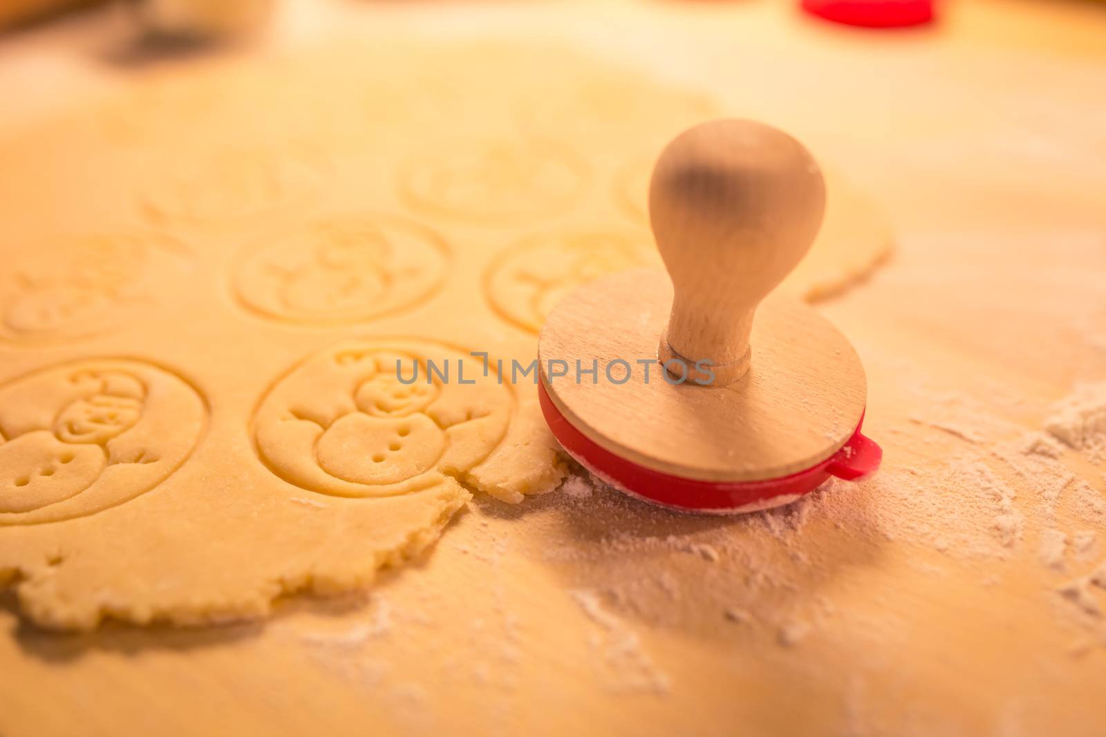 Christmas cookies bakery with raw biscuit dough and cutters with christmas theme shape - Christmas theme dough stamp, Snowman. by petrsvoboda91