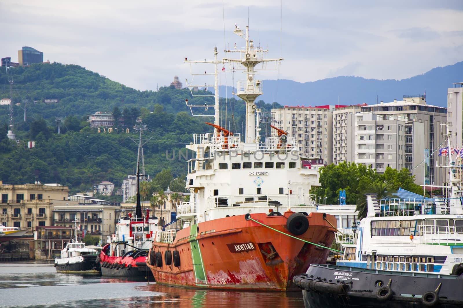 BATUMI, GEORGIA - JULY 08, 2020 - Port of Batumi, boats in harbor. Colorful boats in the Black sea.