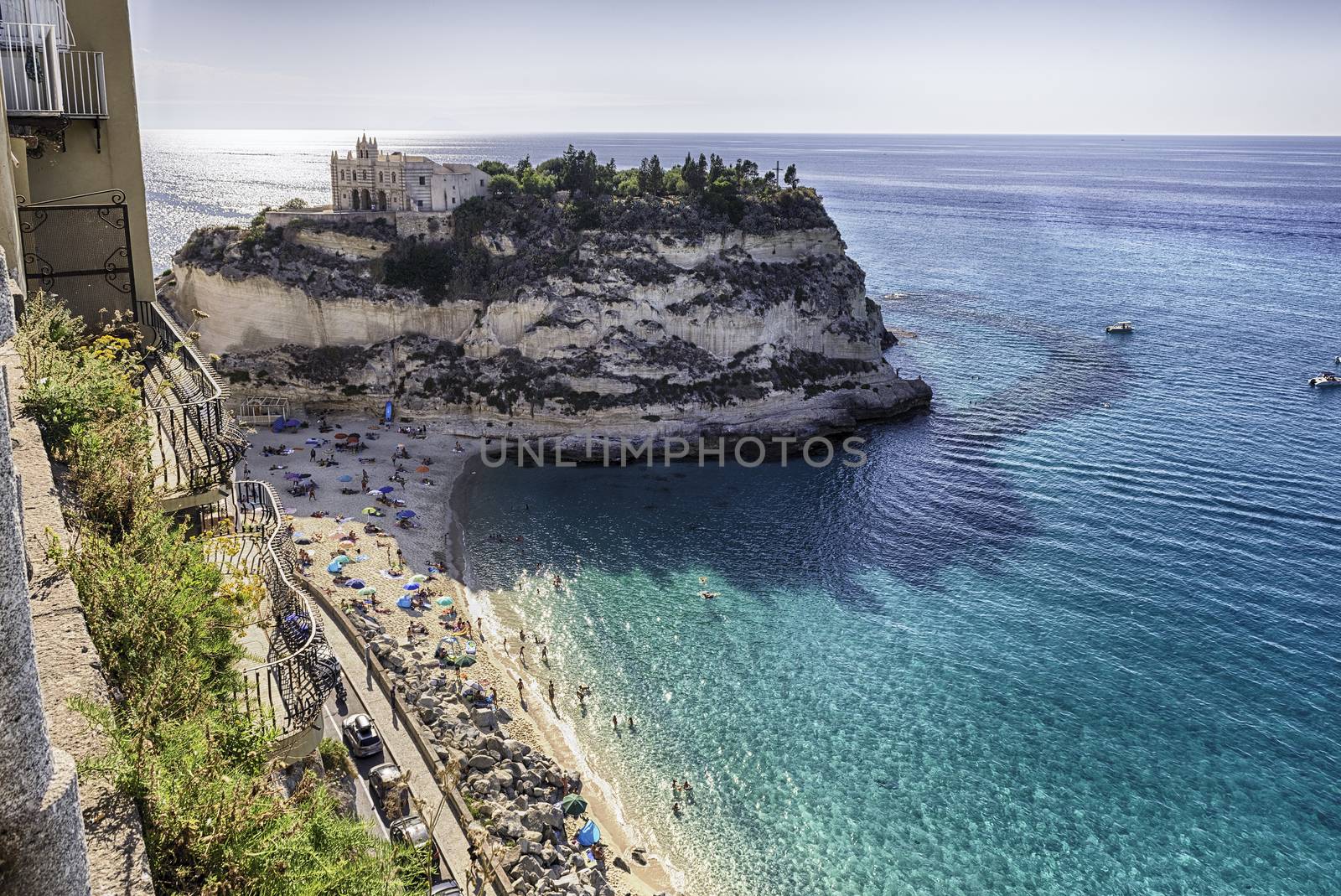 View over Isola Bella Beach, iconic seaside place in Tropea, a seaside resort located on the Gulf of Saint Euphemia, part of the Tyrrhenian Sea, Calabria, Italy