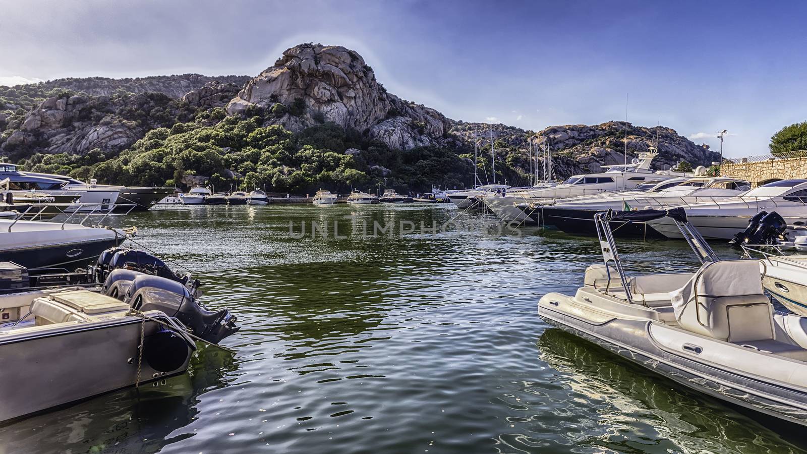 The scenic harbor of Poltu Quatu, Costa Smeralda, Sardinia, Ital by marcorubino
