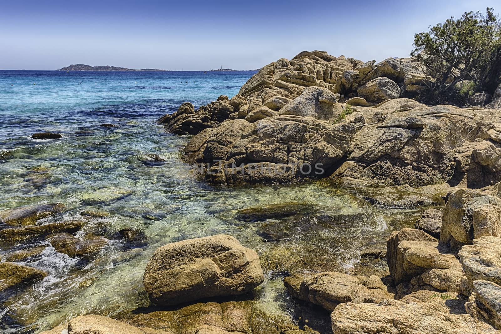 The scenic Capriccioli beach in Costa Smeralda, Sardinia, Italy by marcorubino