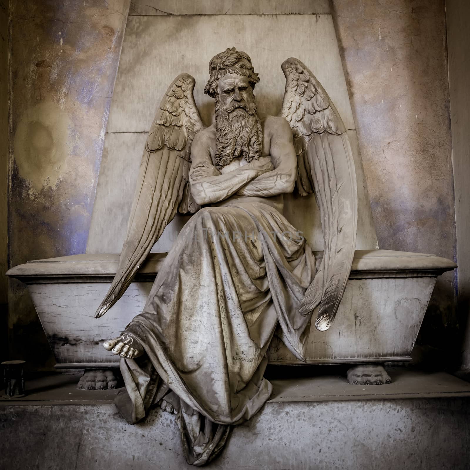 GENOA, ITALY - June 2020: antique statue of angel (beginning 1900, marble) in a Christian Catholic cemetery - Italy