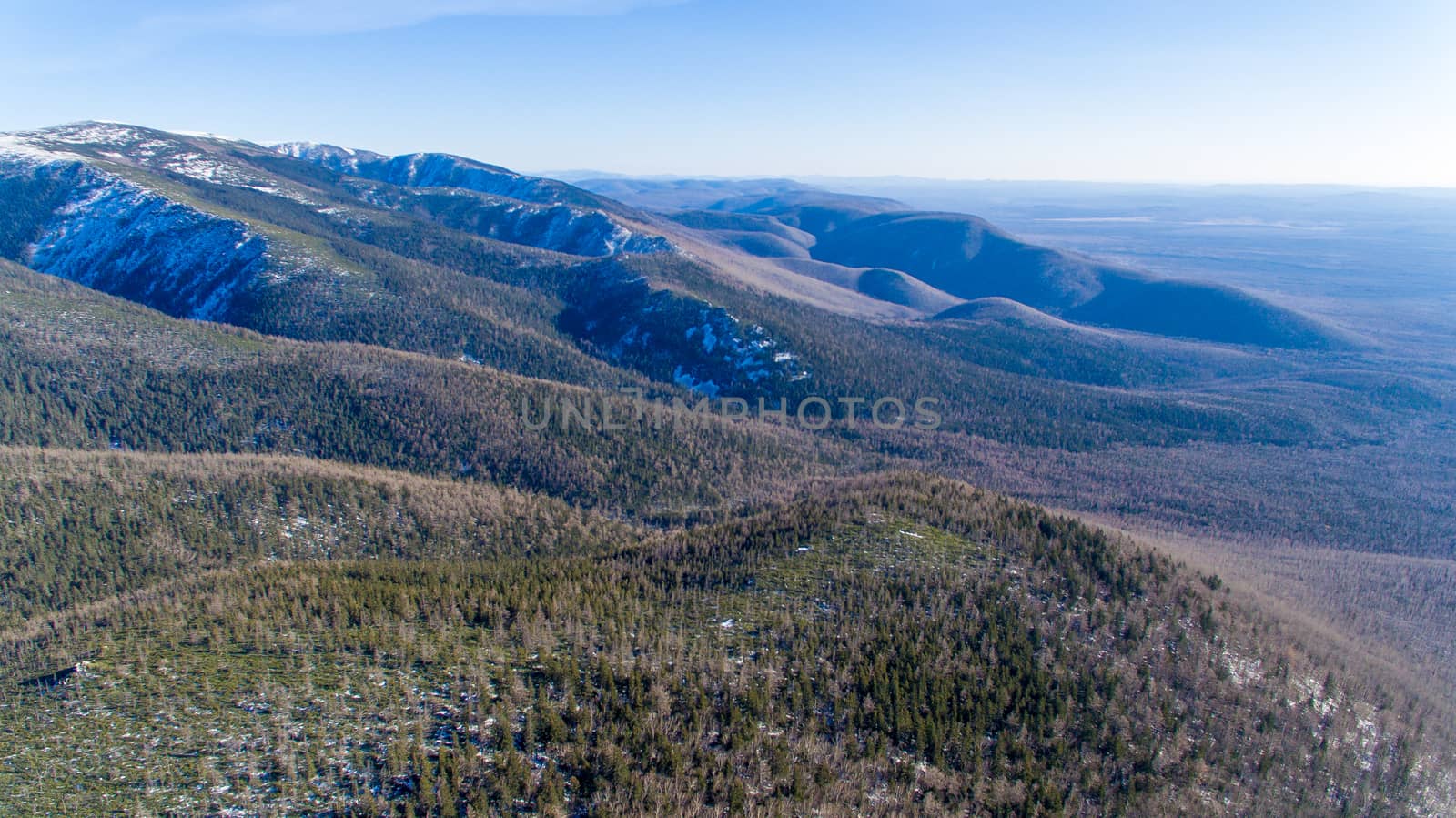 View from above. Endless green hills in the north of Russia