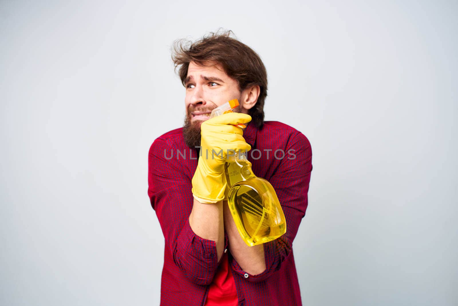 man detergent rubber gloves rendering service cropped view . High quality photo