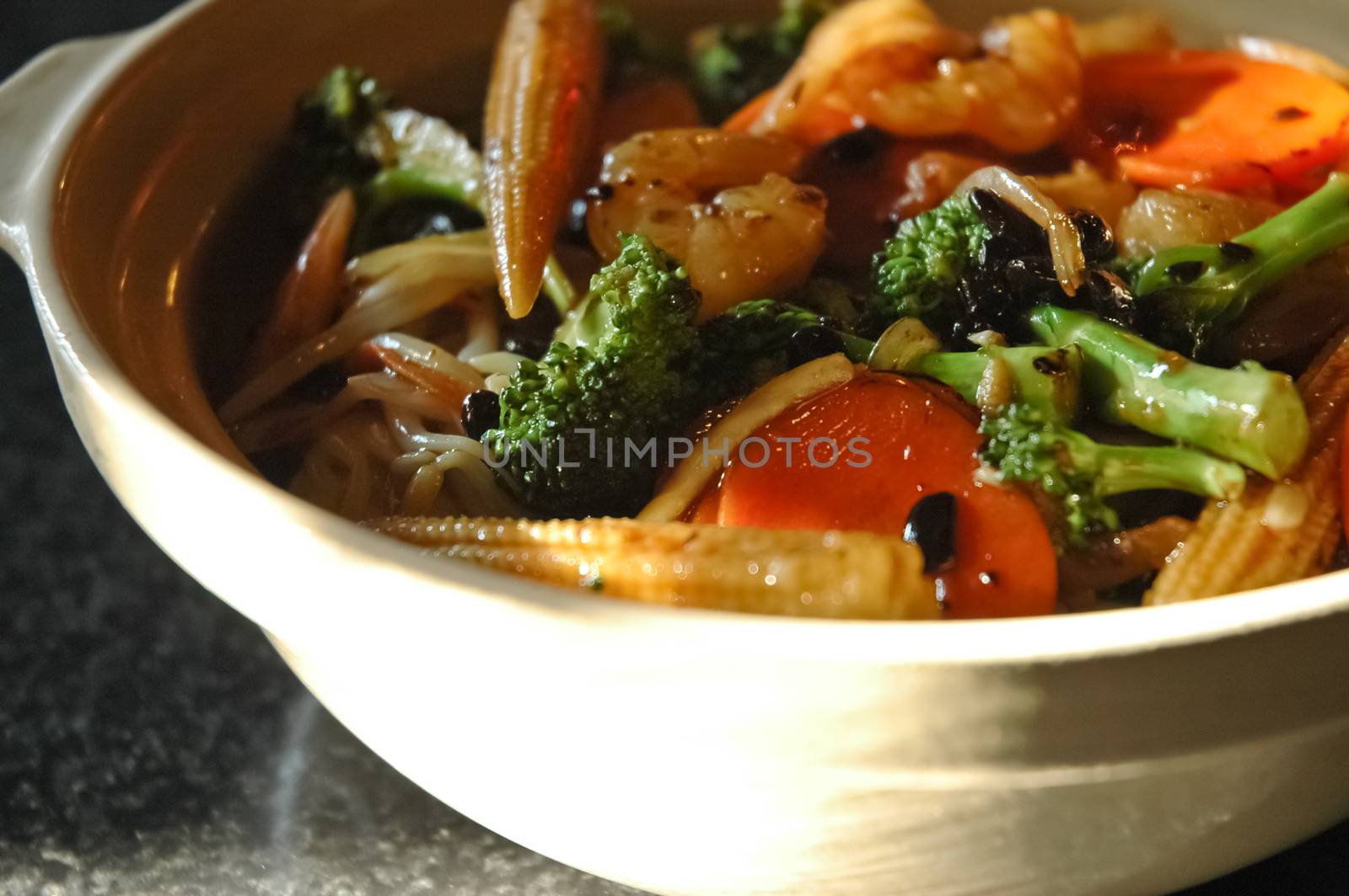 Closed up of beef Chinese vegetable stir-fried in hot pot on rice with black bean sauce