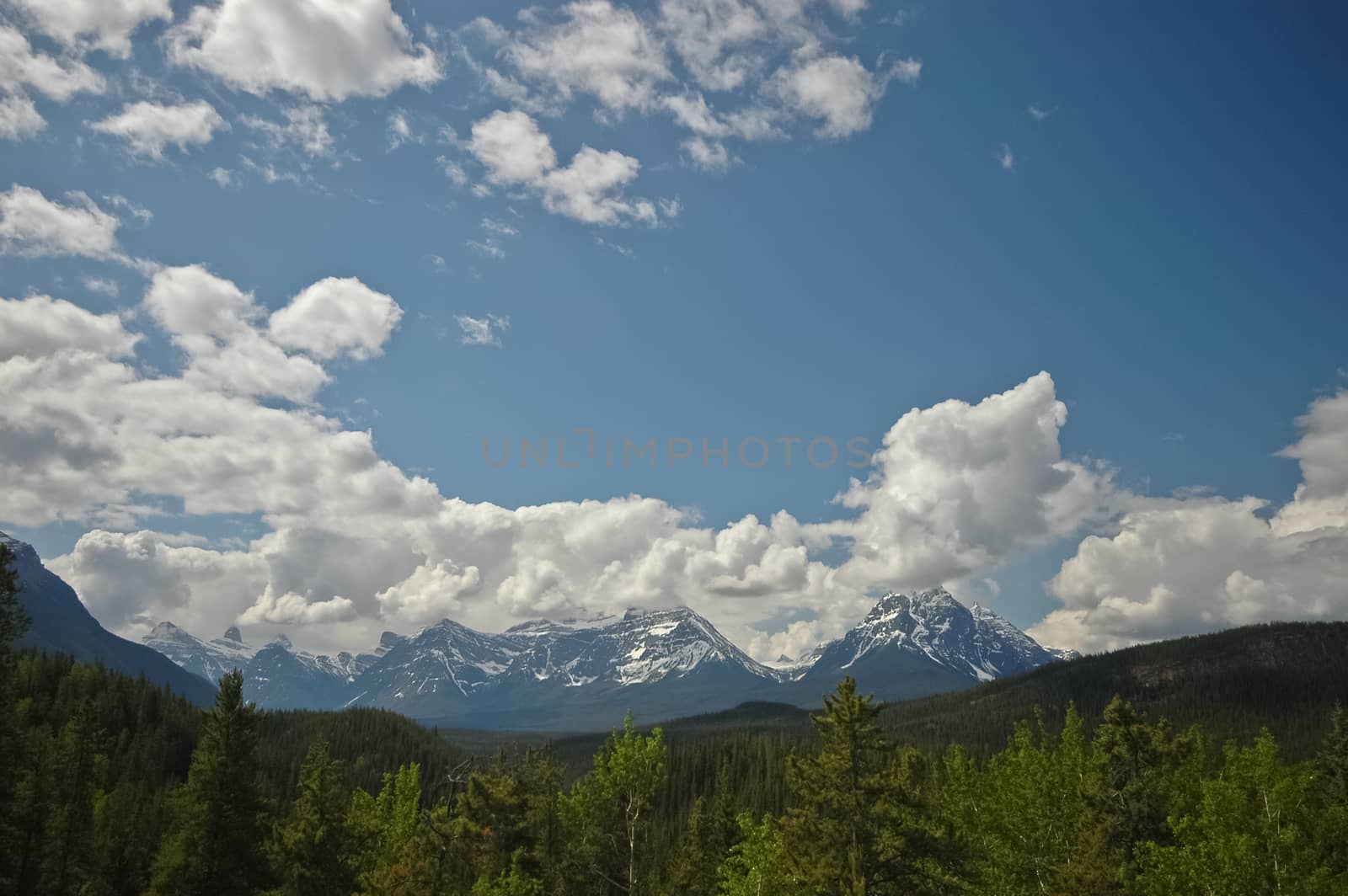 sunny blue sky and snow mountain by eyeofpaul