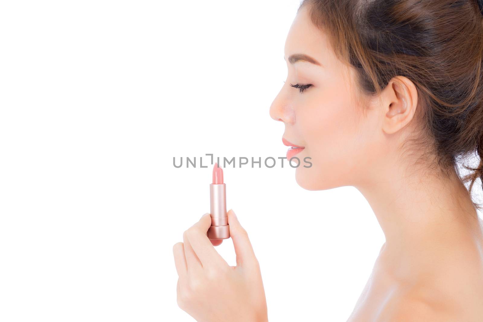 Beauty asian woman applying make up with lipstick of mouth isolated on white background, Beautiful girl on lips with happy, skincare and cosmetic concept.