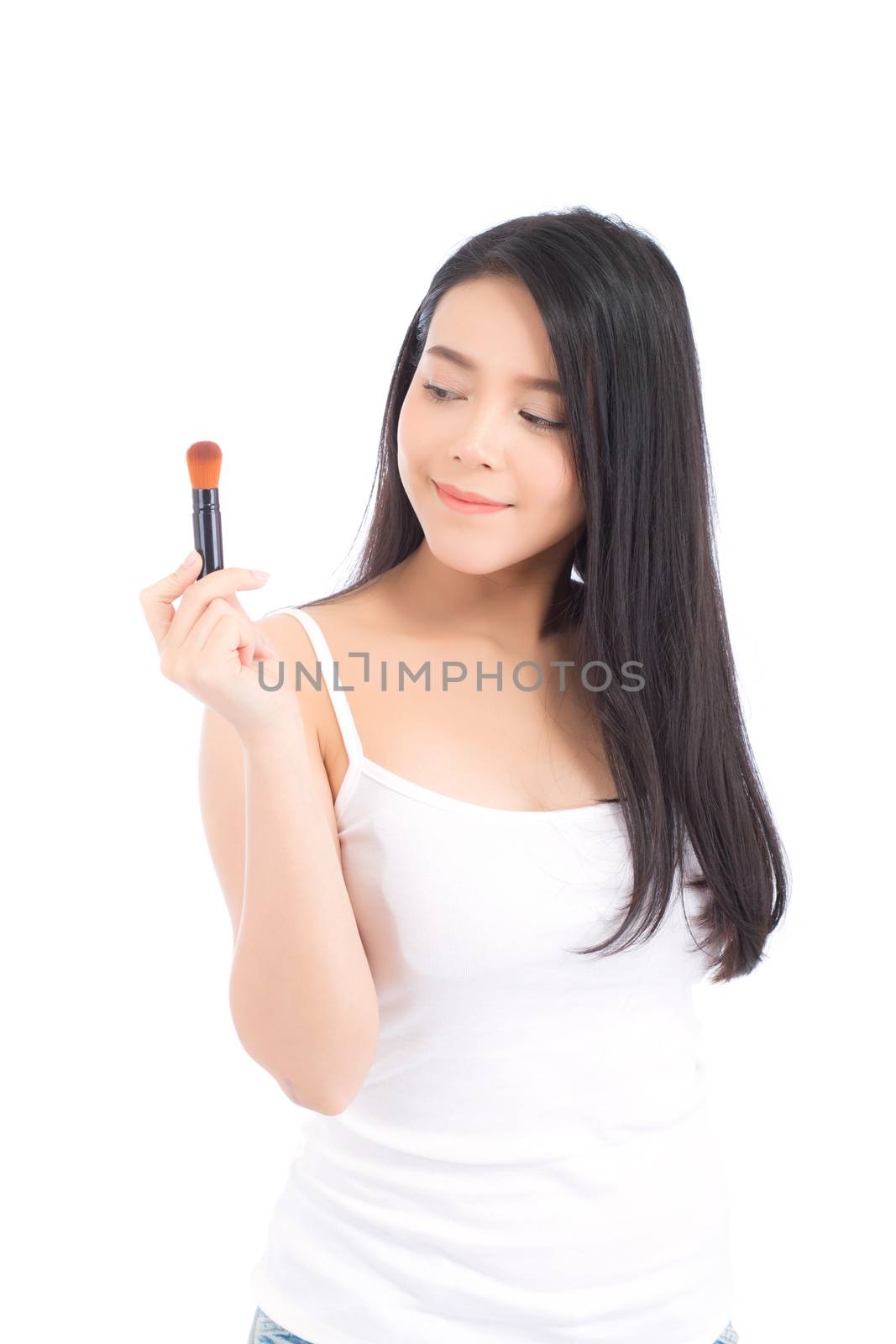 Beauty asian woman applying make up with brush of cheek isolated on white background, beautiful of girl holding blusher, skincare and cosmetic concept.