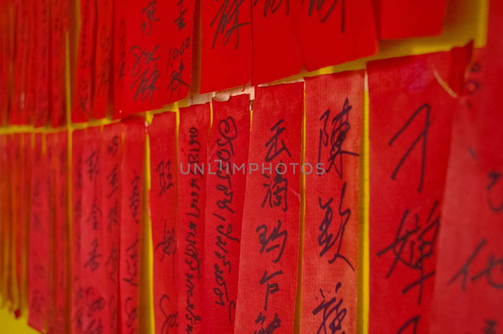 handwritten Chinese calligraphic charactors on red tags by eyeofpaul