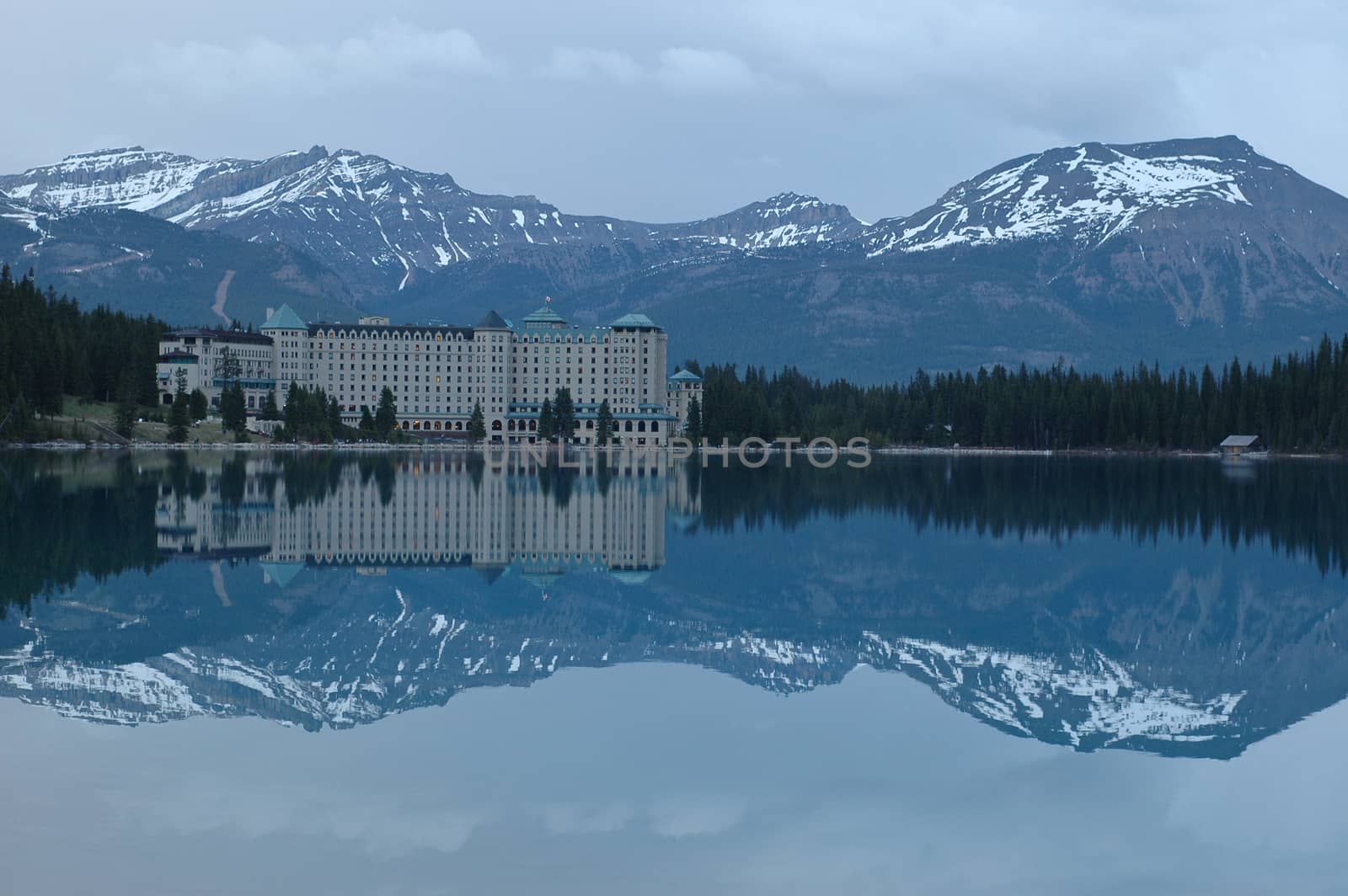 grand hotel reflection in snow mountain