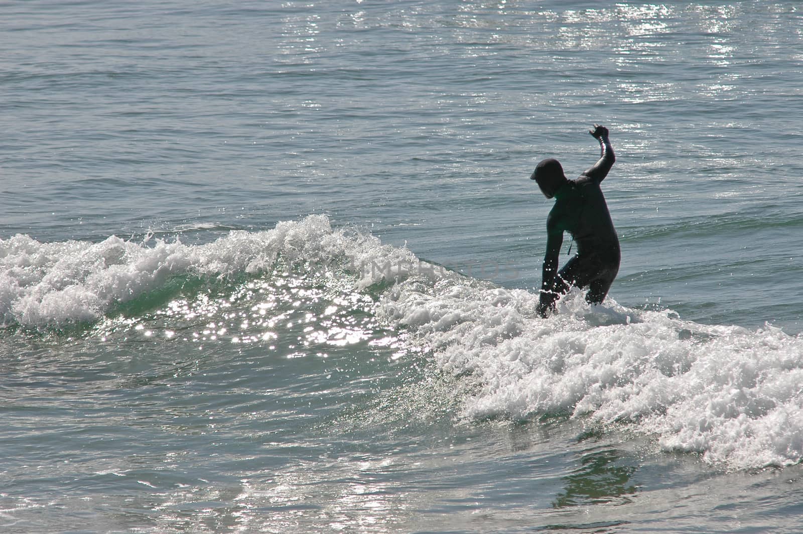 surfer on the sunny beach by eyeofpaul