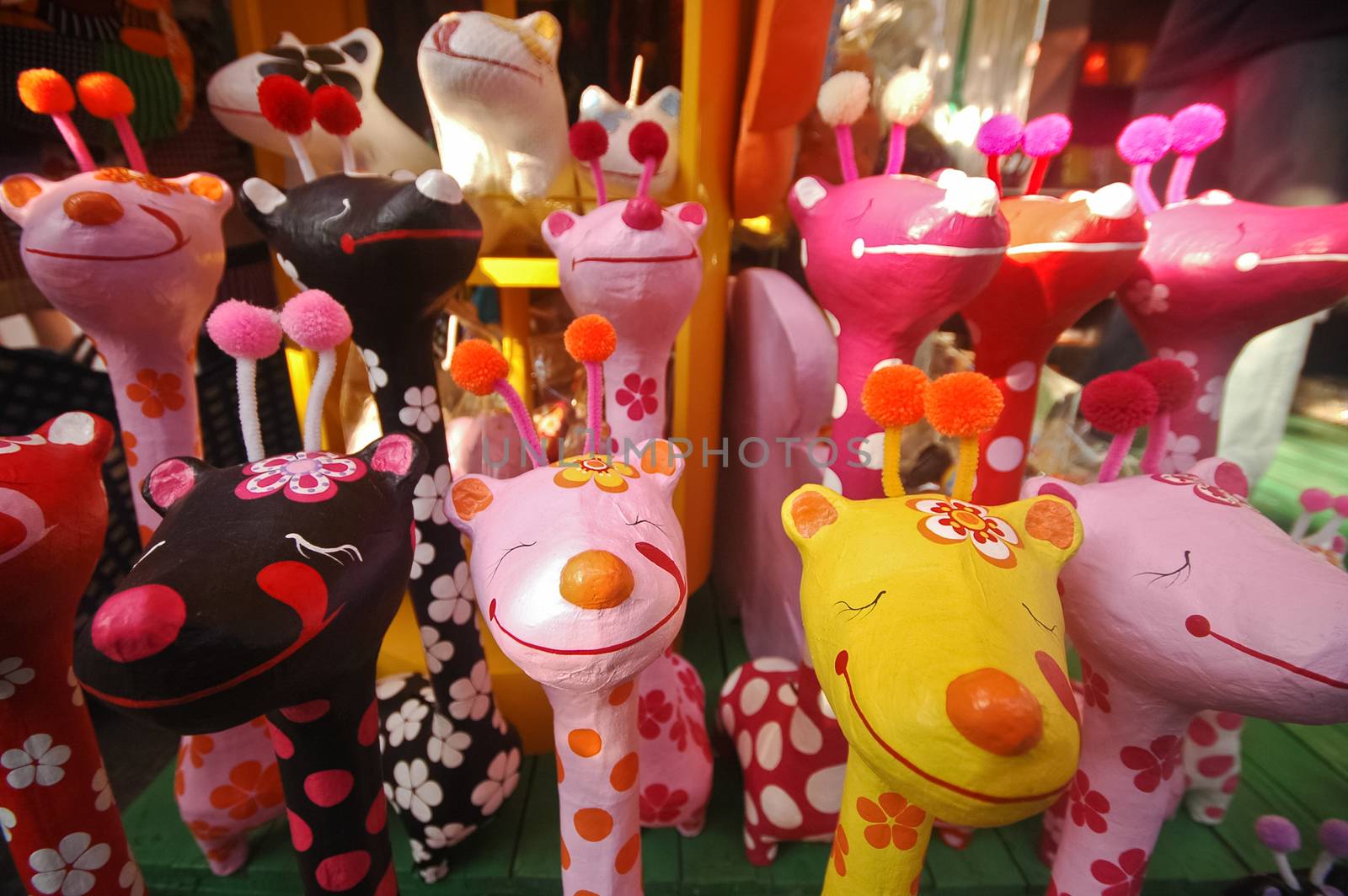 Colourful happy giraffe wooden doll in Thailand by eyeofpaul