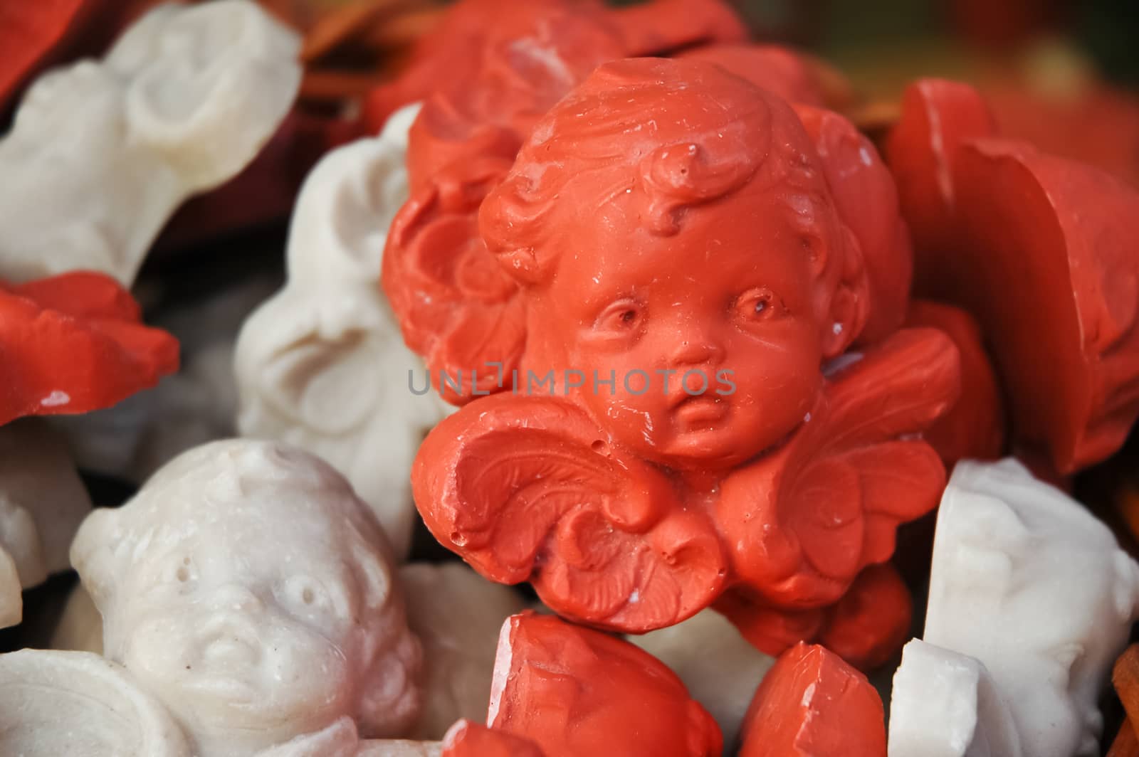 little ceramic ornaments of cute cupids by eyeofpaul