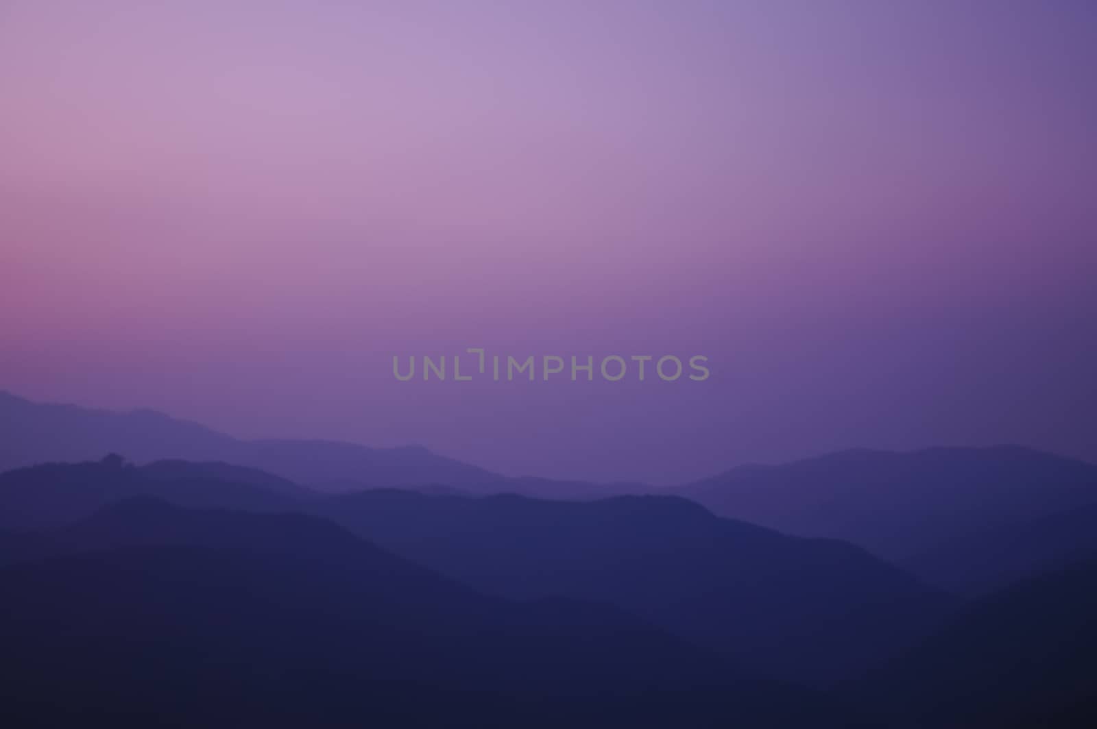 twilight sunset at the peak of the mountain by eyeofpaul