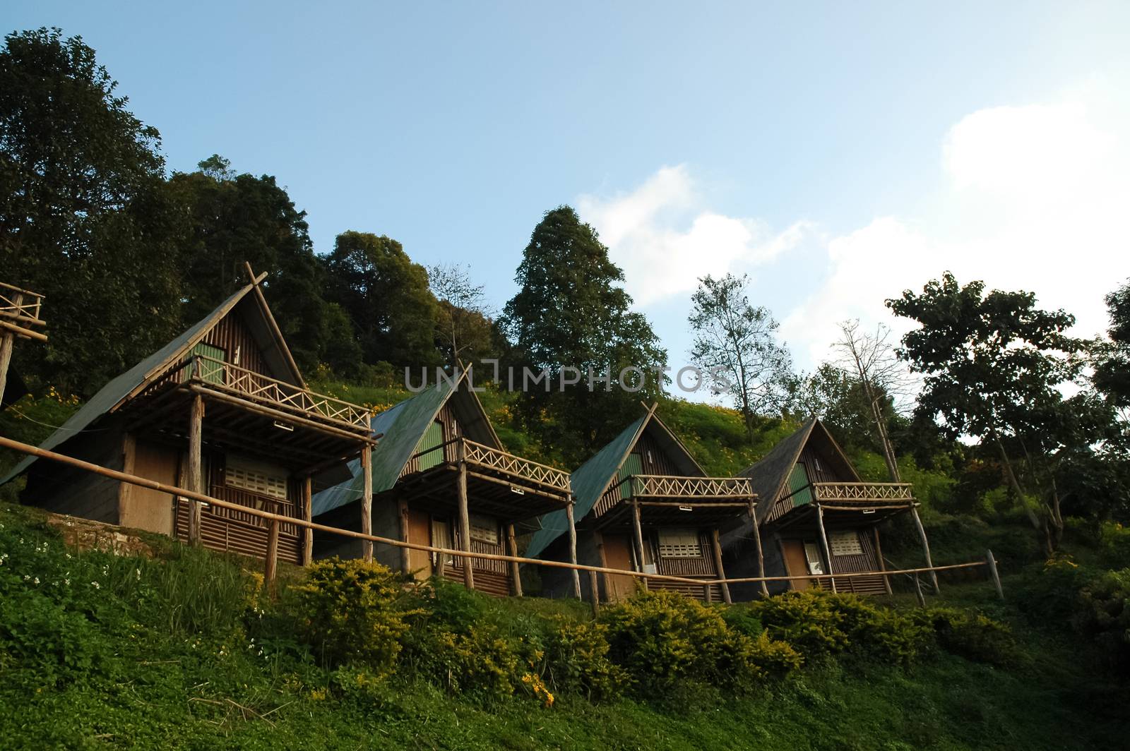 Lovely pairs of wooden cottages in Northern Thailand