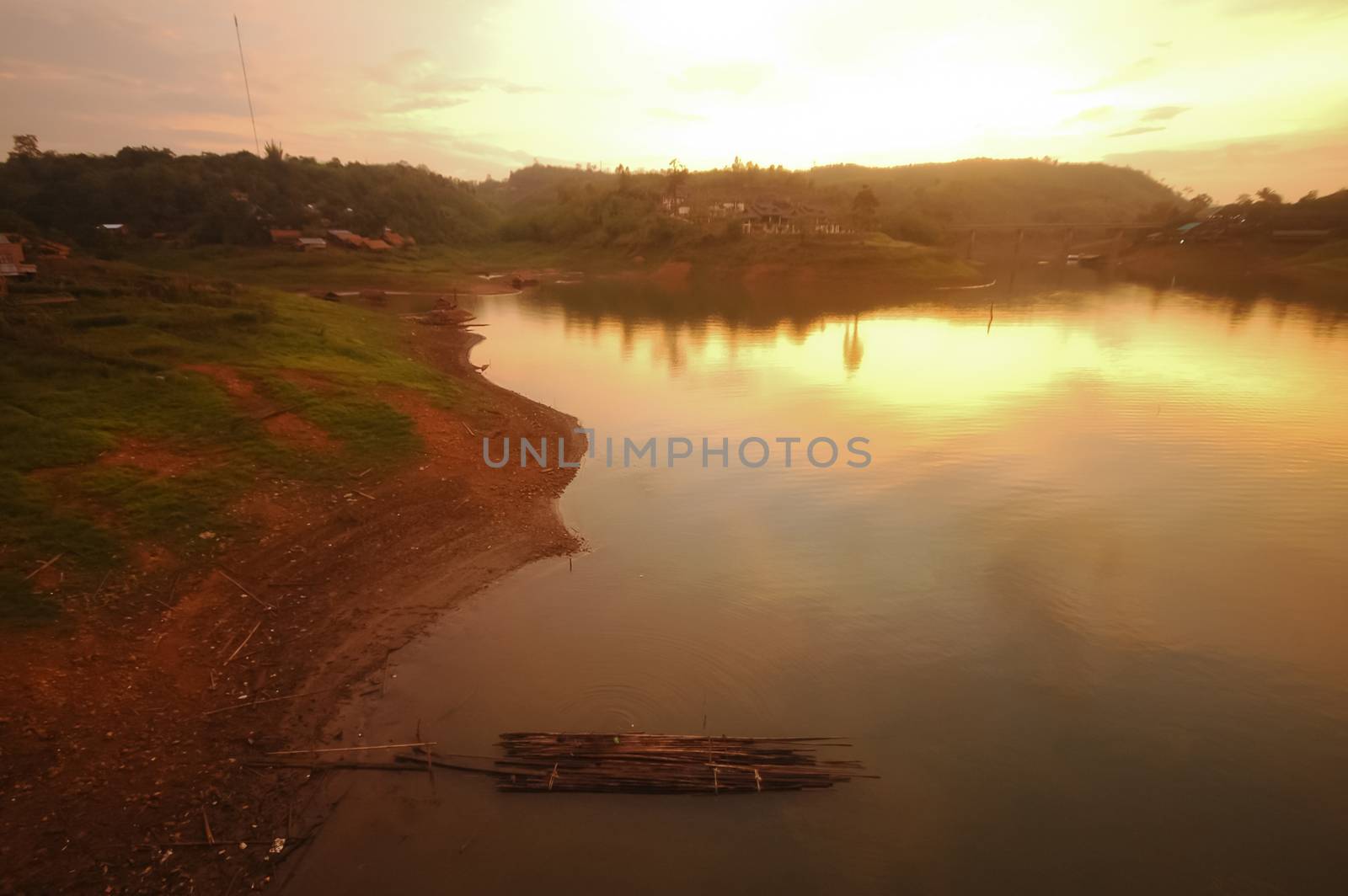 Twilight hills and river life in Sangkhlaburi village Western Thailand