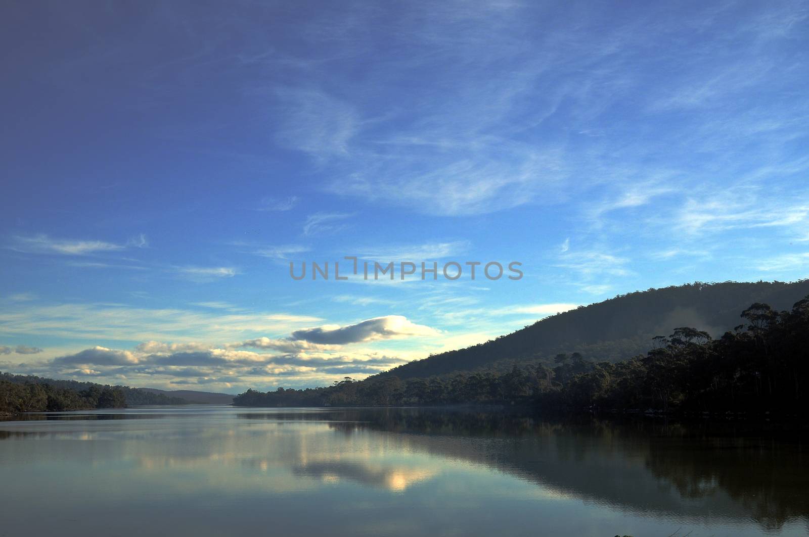 Peaceful reflection of Cradle Mountain in the lake in Tasmania A by eyeofpaul