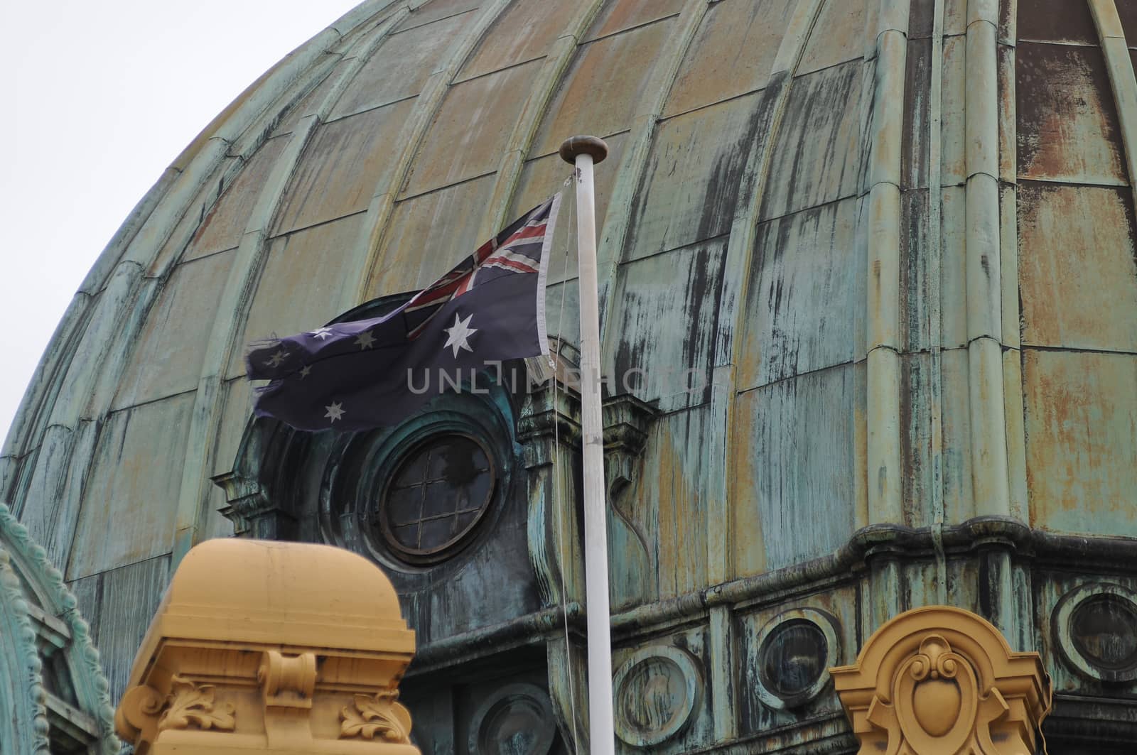 Australian national flag flying on a big dome