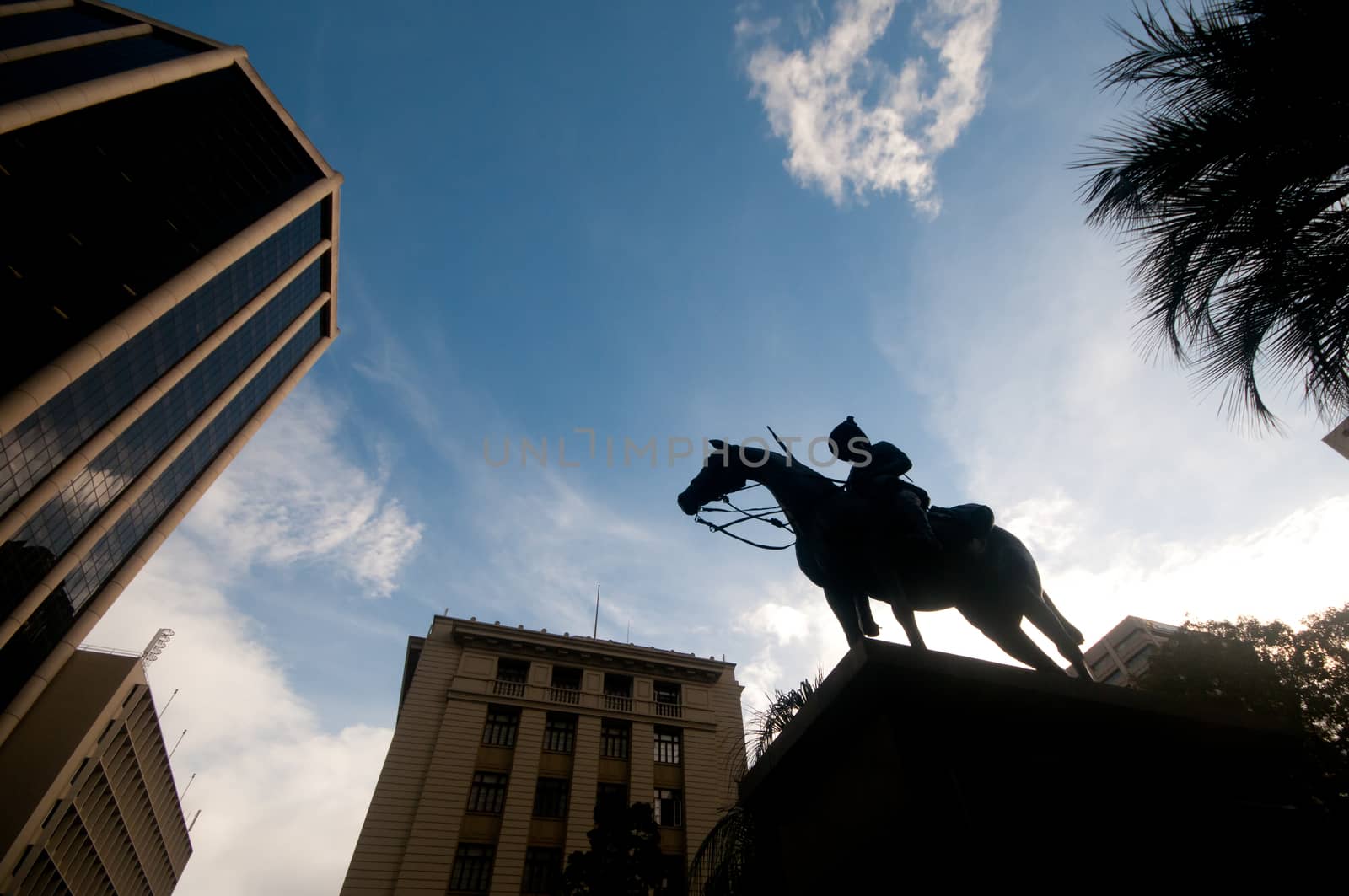 Silhouette of majestic horse soldier knight in the city centre by eyeofpaul