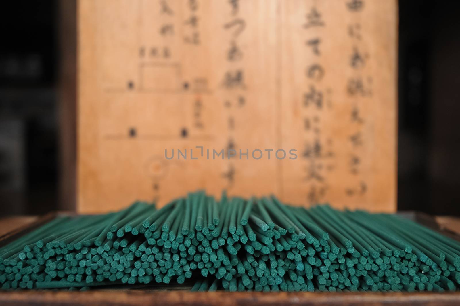 Green incense sticks in Kyoto asian shrine, Japan