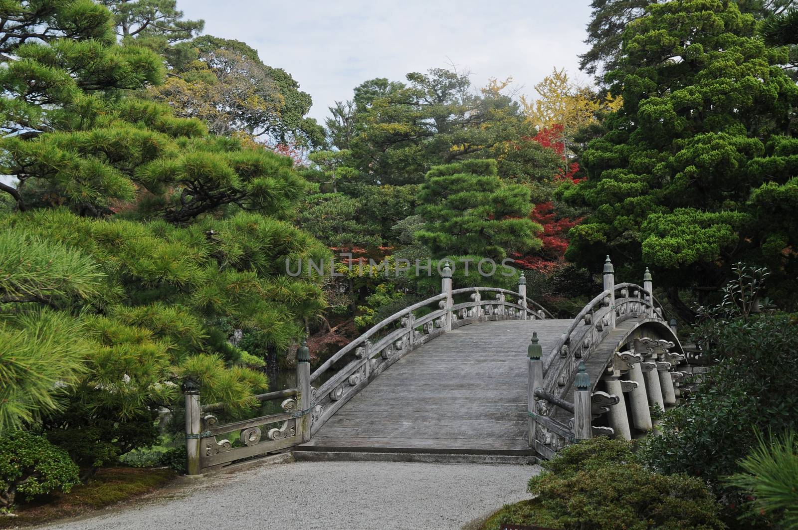 Old royal Japanese stone bridge in Autumn by eyeofpaul