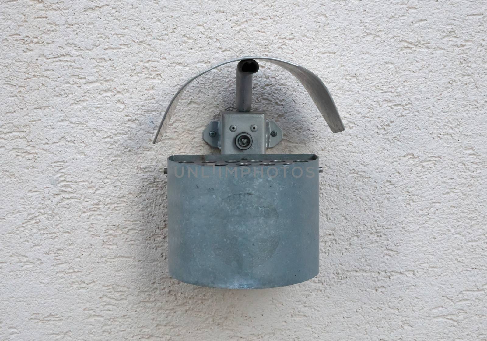 Exterior wall mounted ashtray by michaklootwijk