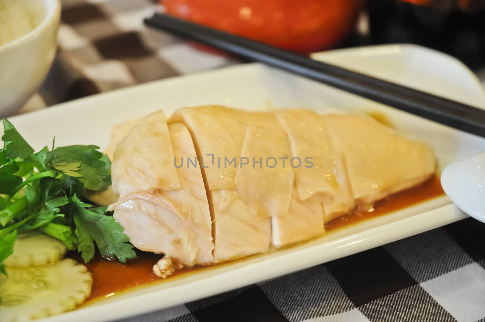 Delicate aromatic Hainanese chicken rice