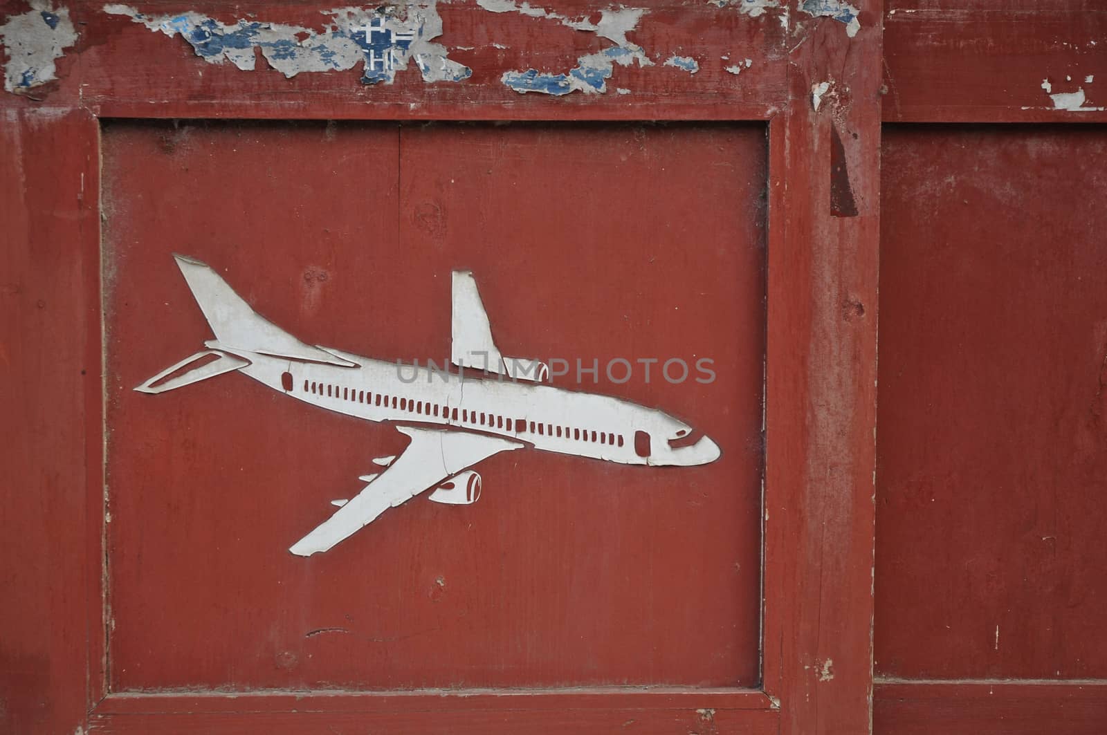 Aeroplane carved on old wooden door pane by eyeofpaul