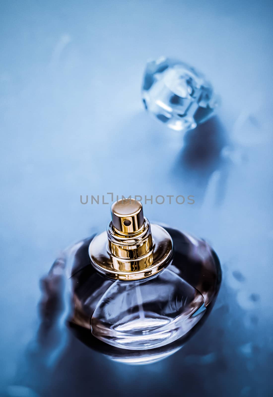 Perfume bottle under blue water, fresh sea coastal scent as glam by Anneleven