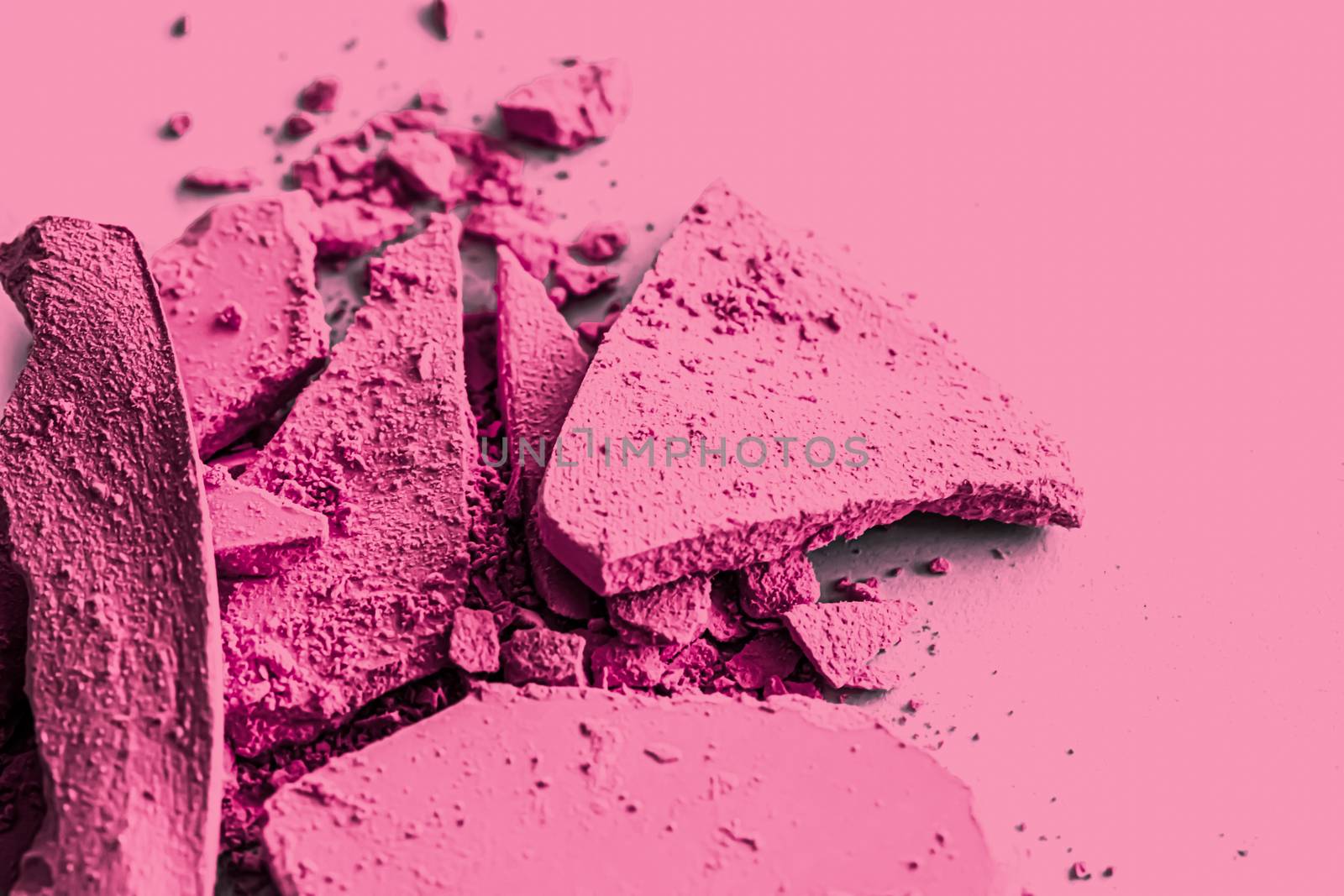 Pink eye shadow powder as makeup palette closeup, crushed cosmetics and beauty textures