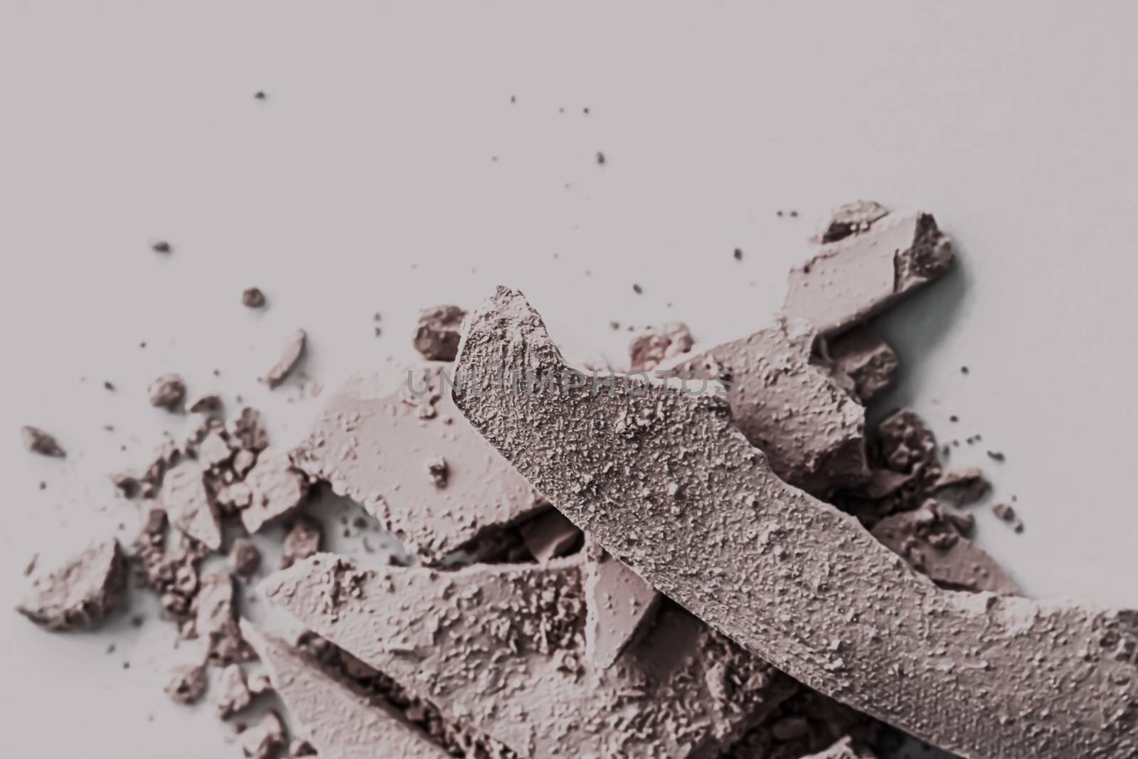Pale eye shadow powder as makeup palette closeup, crushed cosmetics and beauty textures