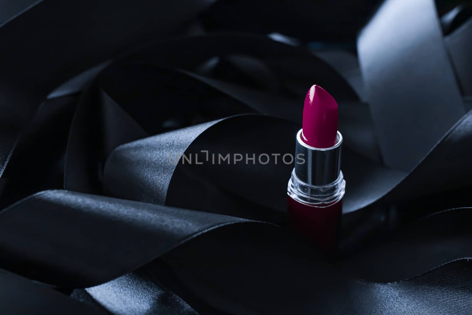 Purple lipstick on black silk background, luxury make-up and bea by Anneleven