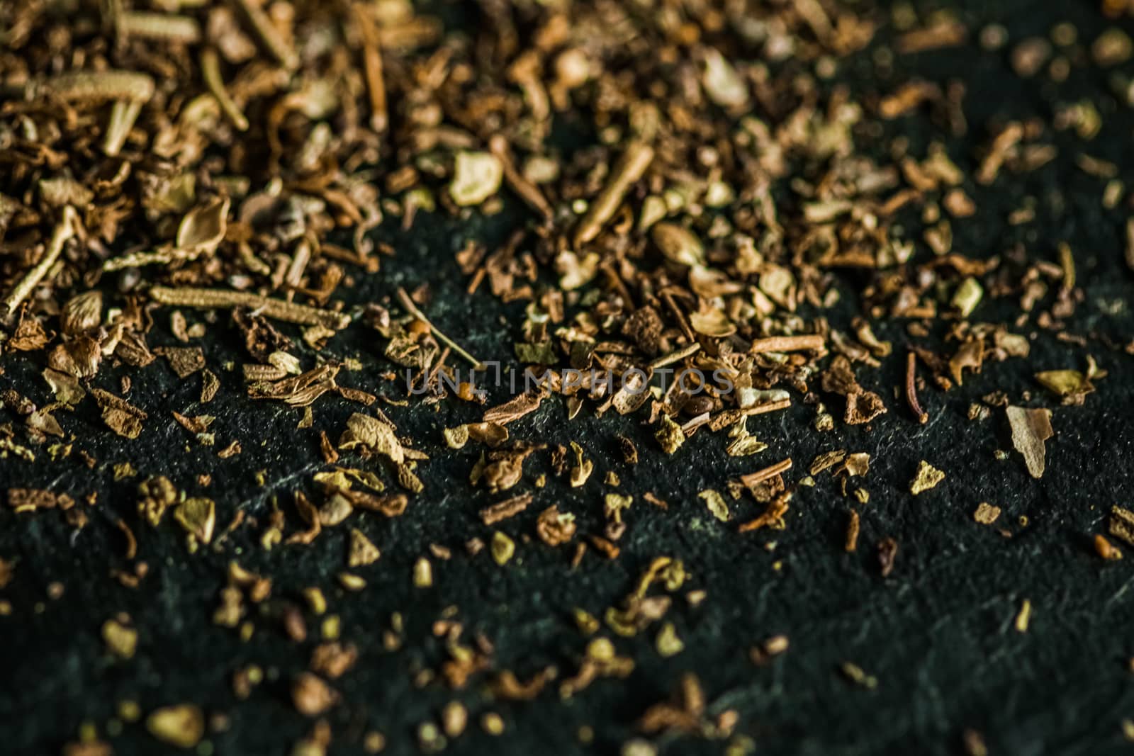 Provencal spices mix closeup on luxury stone background as flat lay, dry food spices and recipe ingredients