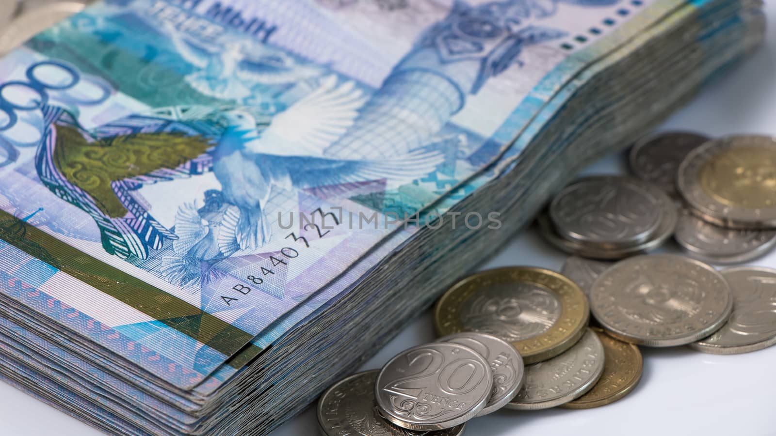 A lot of money Kazakhstan tenge on a white background. The natio by YevgeniySam