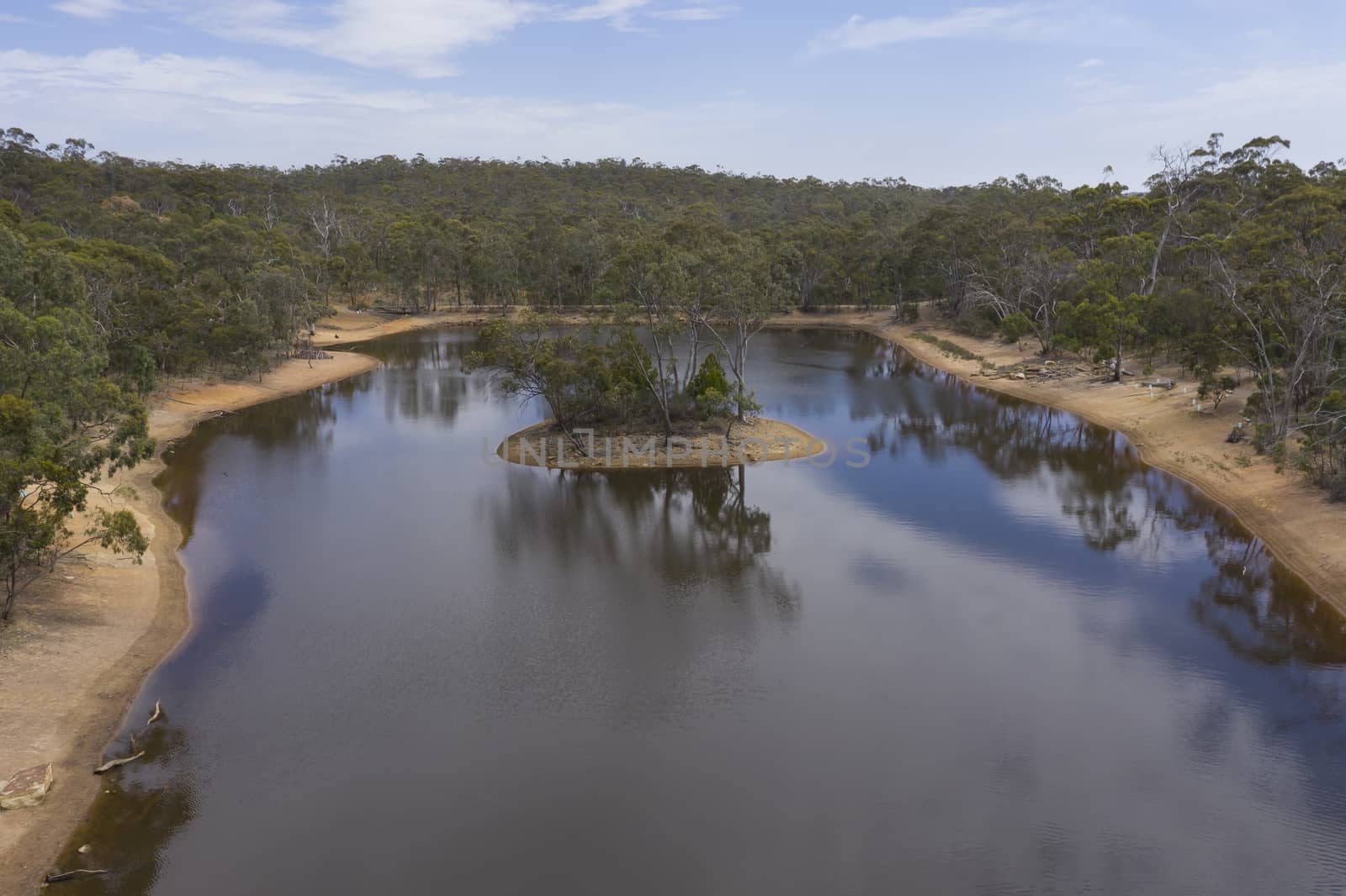Aerial view of a drought affected water reservoir in regional Australia by WittkePhotos