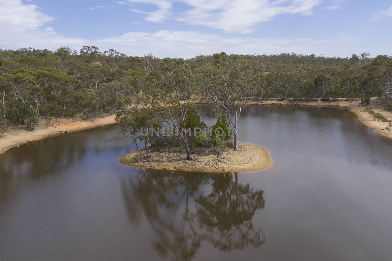 Aerial view of a drought affected water reservoir in regional Australia by WittkePhotos