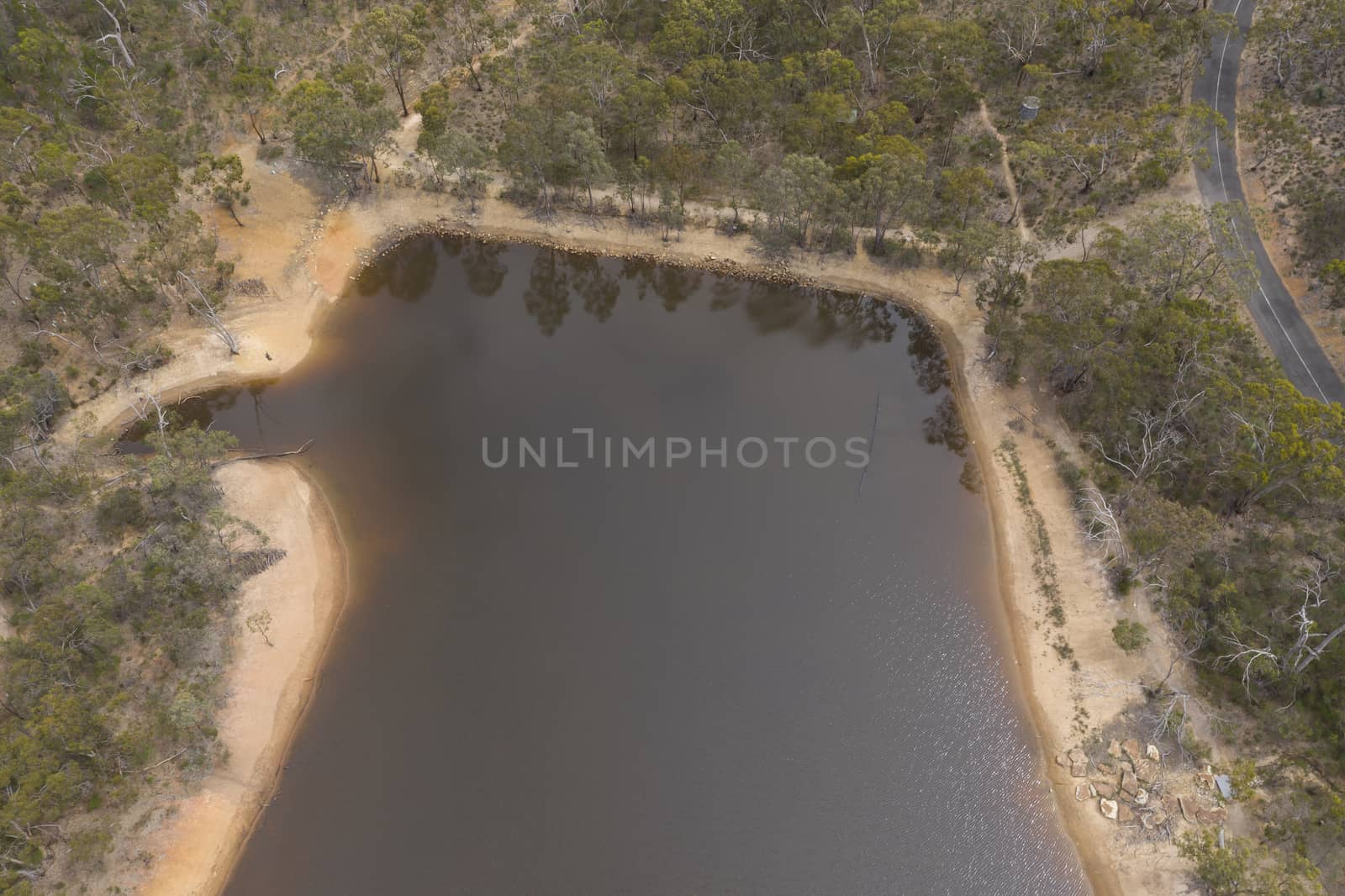 Aerial view of a drought affected water reservoir in regional Australia