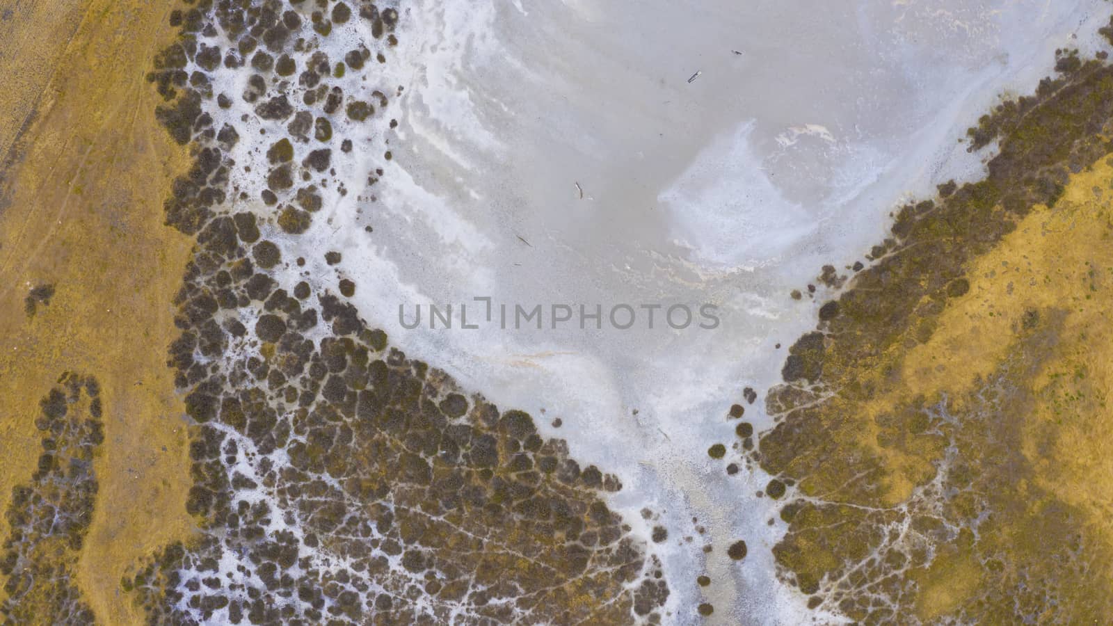 Aerial view of a water reservoir affected by drought in regional Australia