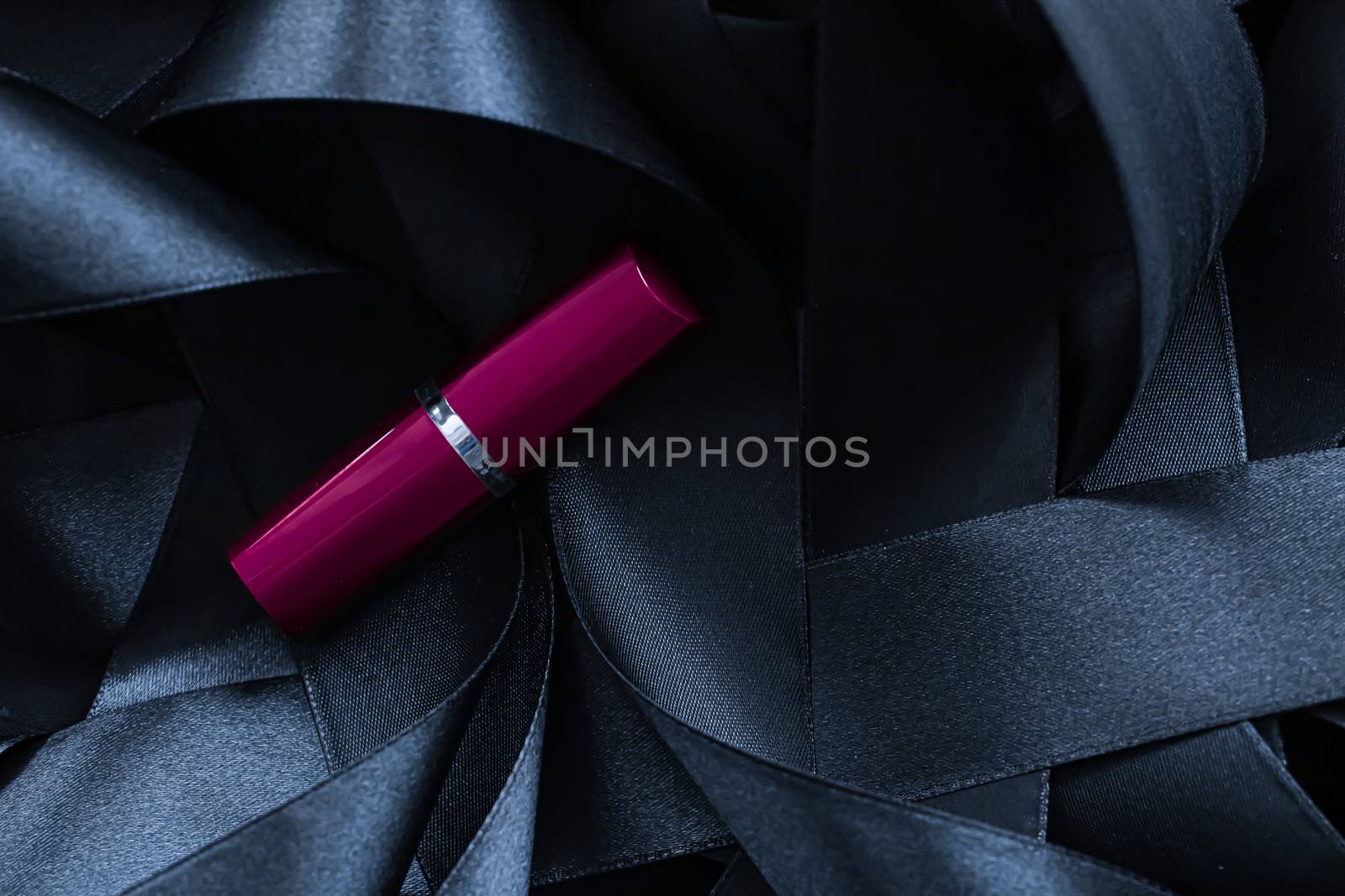 Purple lipstick on black silk background, luxury make-up and bea by Anneleven