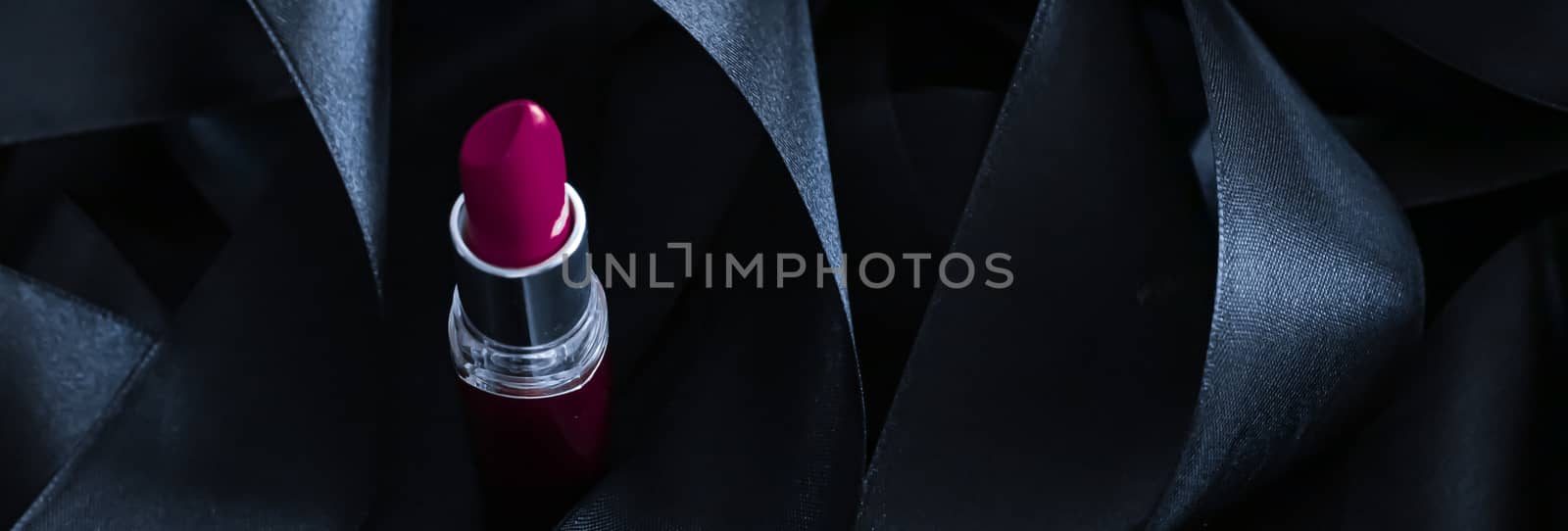 Purple lipstick on black silk background, luxury make-up and bea by Anneleven