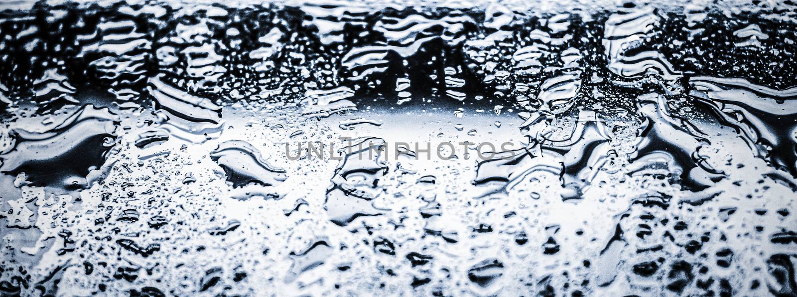 Liquid, wet and zen concept - Water texture abstract background, aqua drops on silver glass as science macro element, rainy weather and nature surface art backdrop for environmental brand design