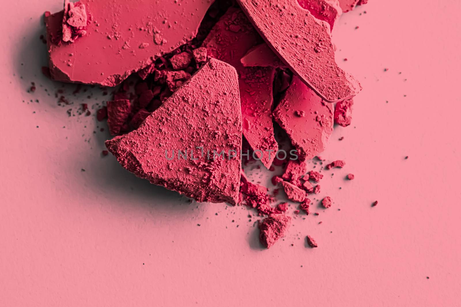 Red eye shadow powder as makeup palette closeup, crushed cosmetics and beauty textures