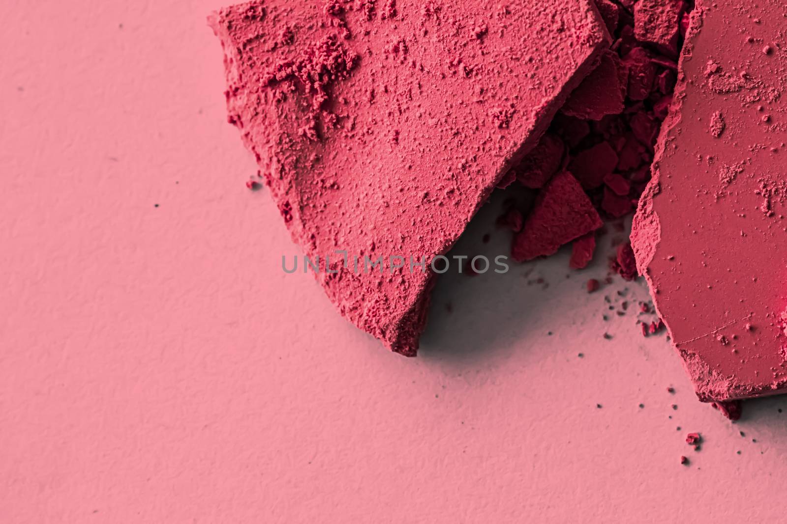 Red eye shadow powder as makeup palette closeup, crushed cosmetics and beauty textures