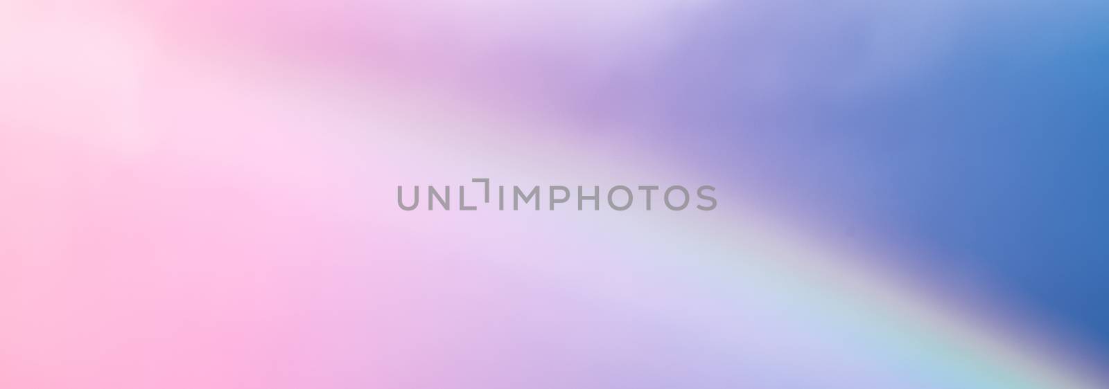 Rainbow in fantasy pink and blue sky, spiritual and nature backgrounds