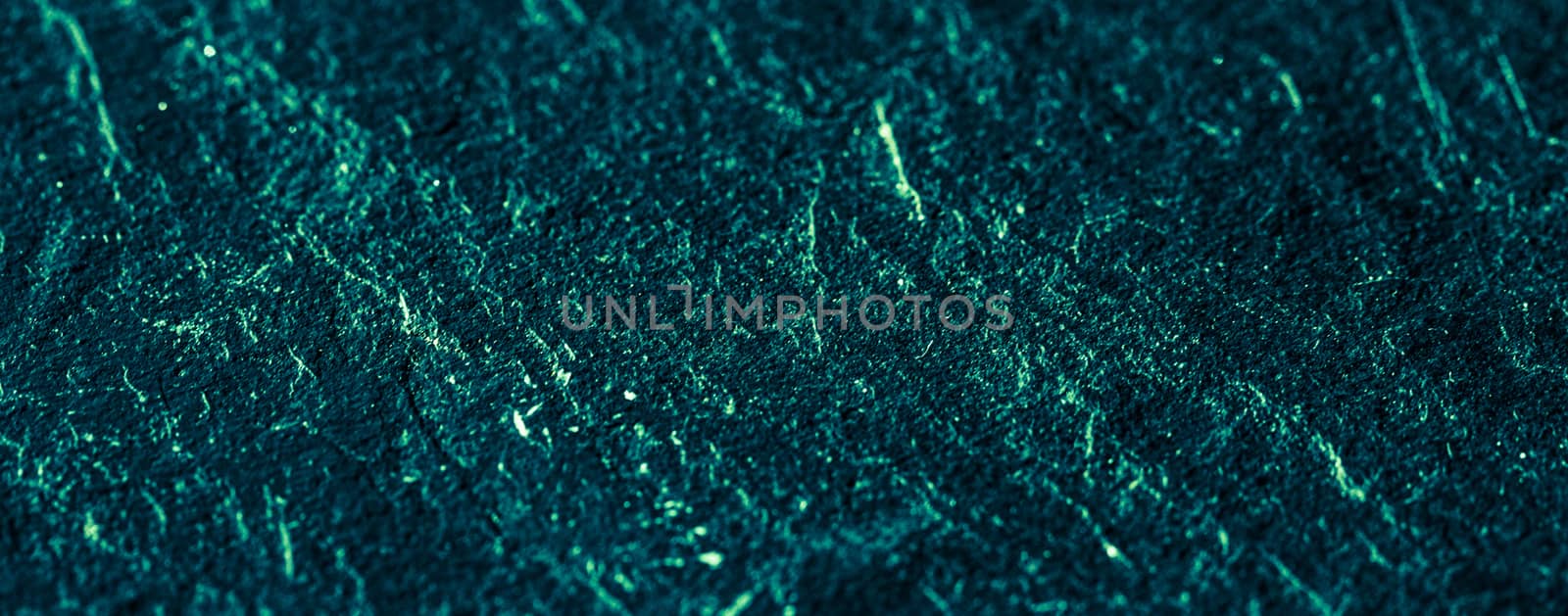 Emerald green stone texture as abstract background, design material and textured surfaces