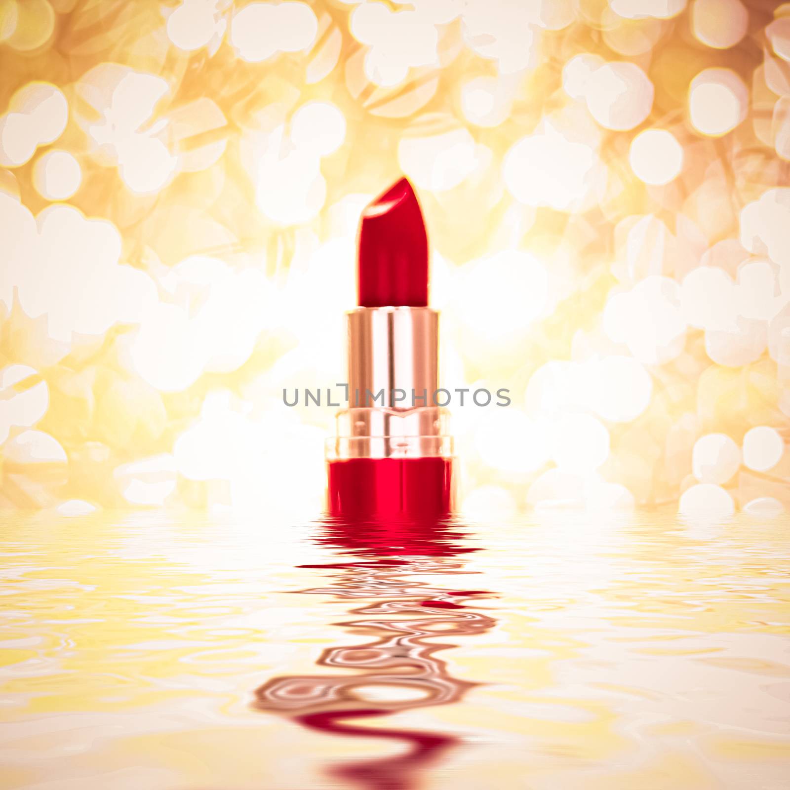 Red lipstick on golden background, make-up and cosmetic product by Anneleven