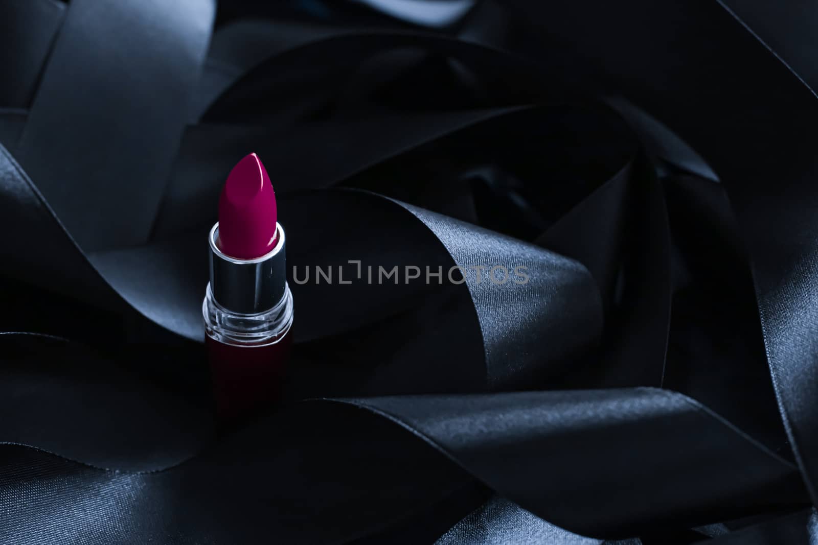 Purple lipstick on black silk background, luxury make-up and bea by Anneleven